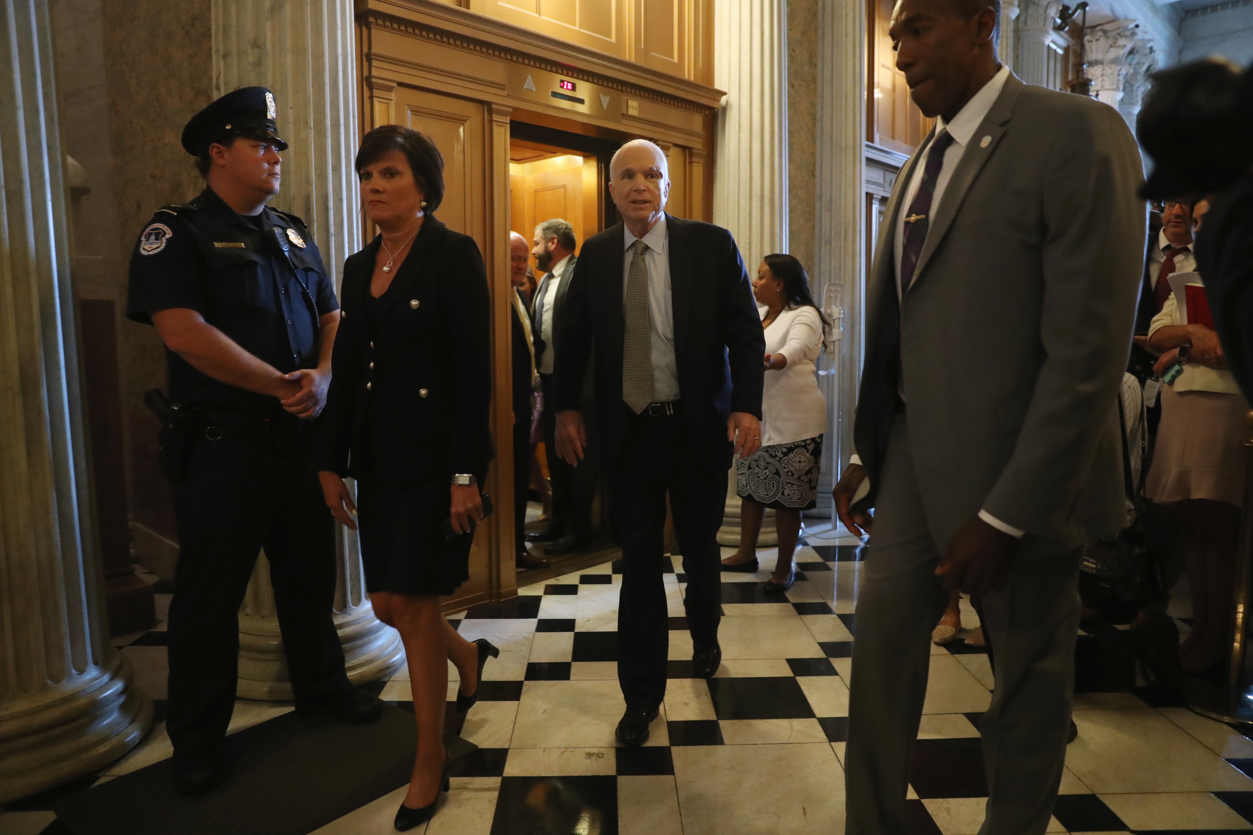 The Latest: McCain calls on both parties to work together