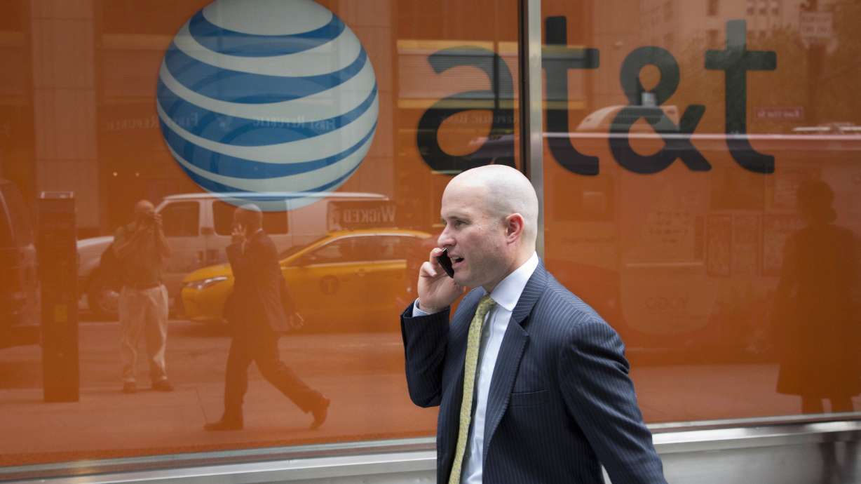 AT&T tops Wall Street's profit, revenue forecasts