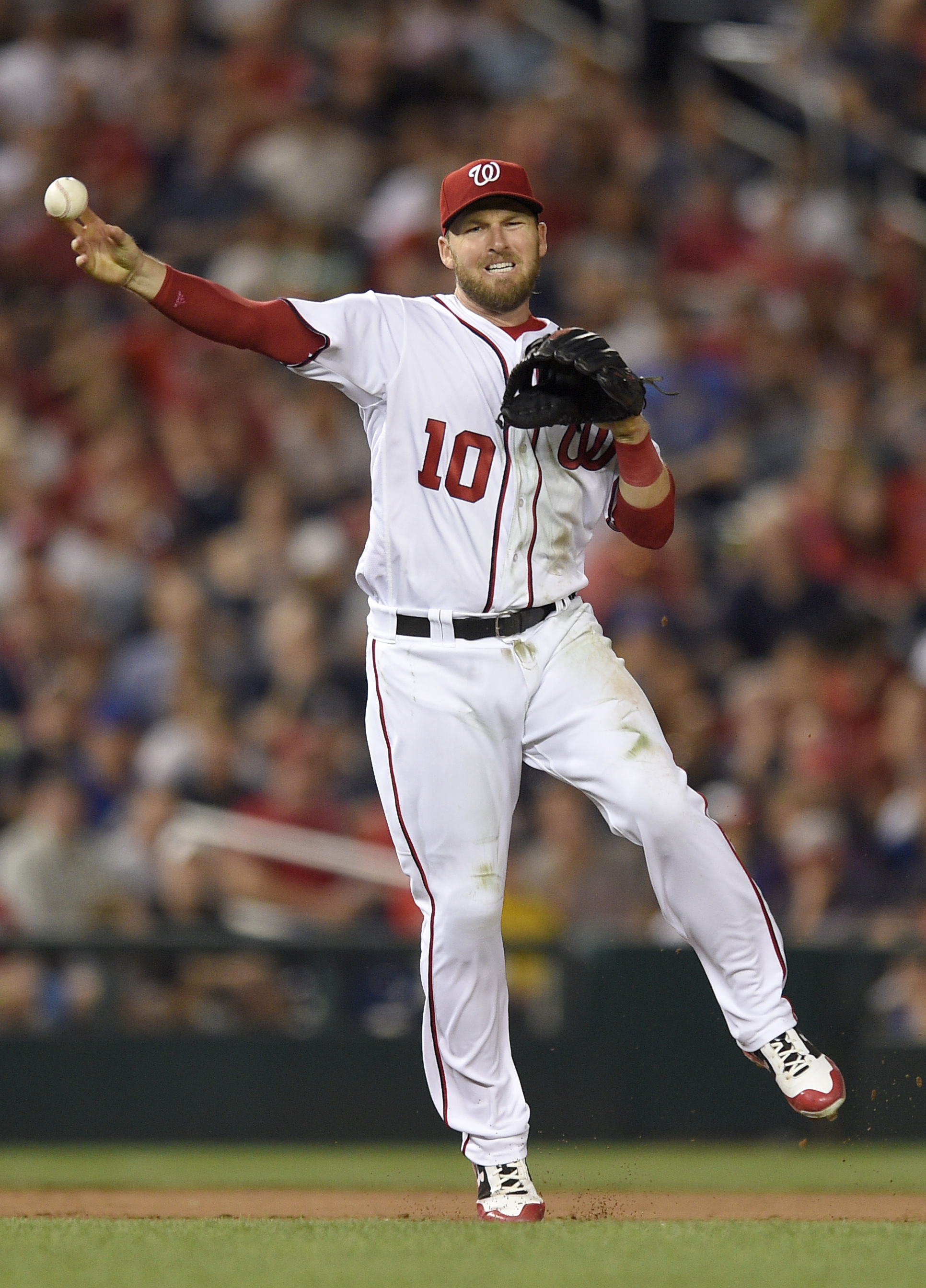 Davies, power bats launch Brewers over Nationals 8-0