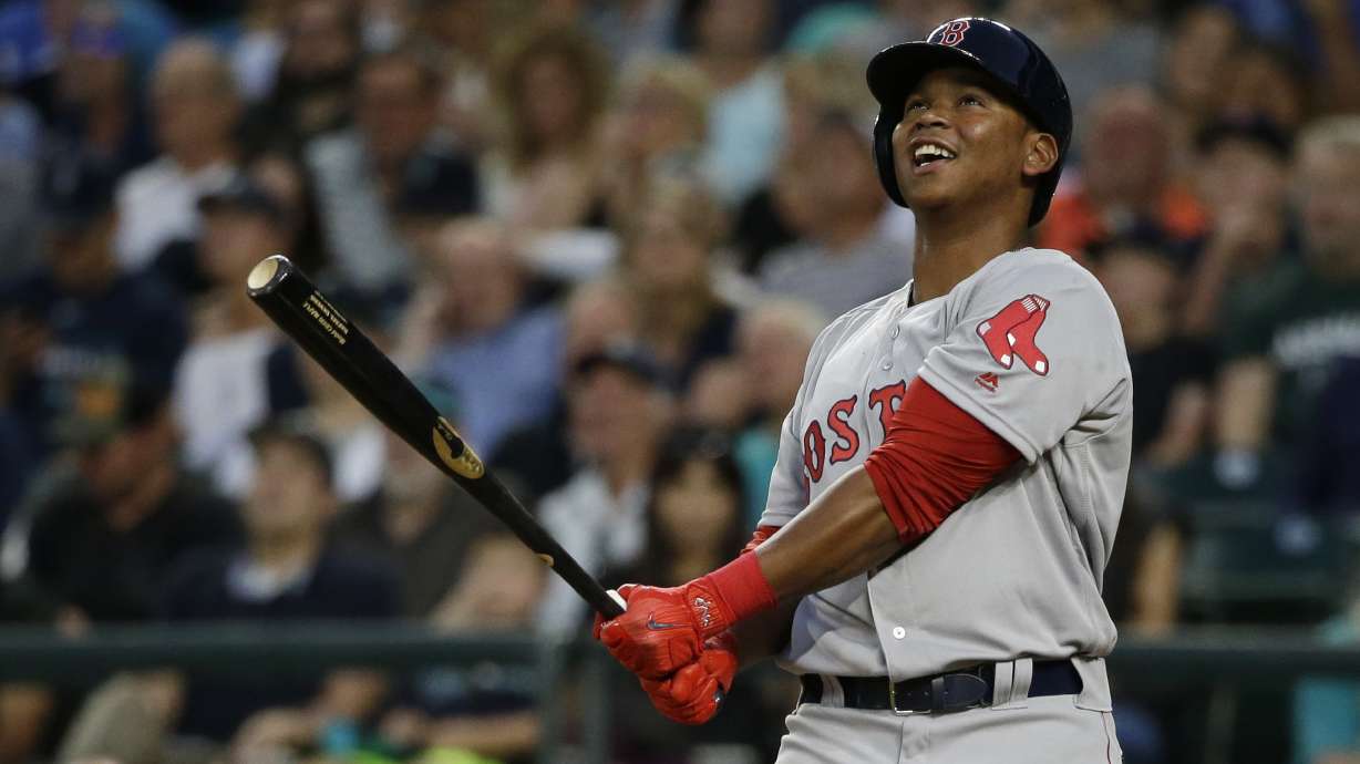 Segura's single in 13th rallies Mariners past Red Sox 6-5