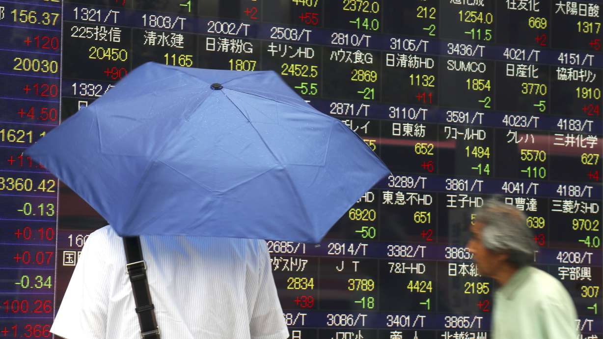 Global stocks rise on corporate earnings, ahead of Fed