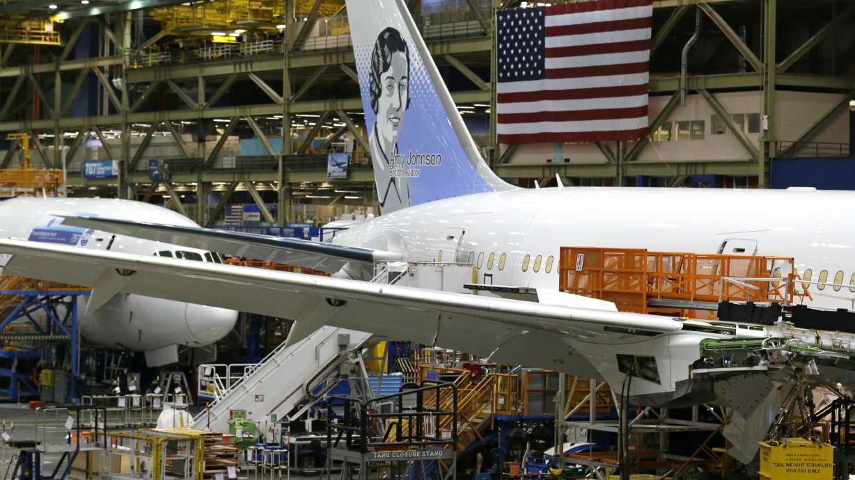 Boeing beats 2Q profit forecasts, raises full-year outlook
