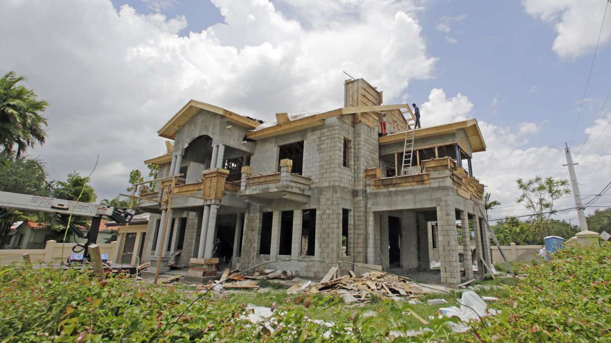 New-home sales improved modestly in June