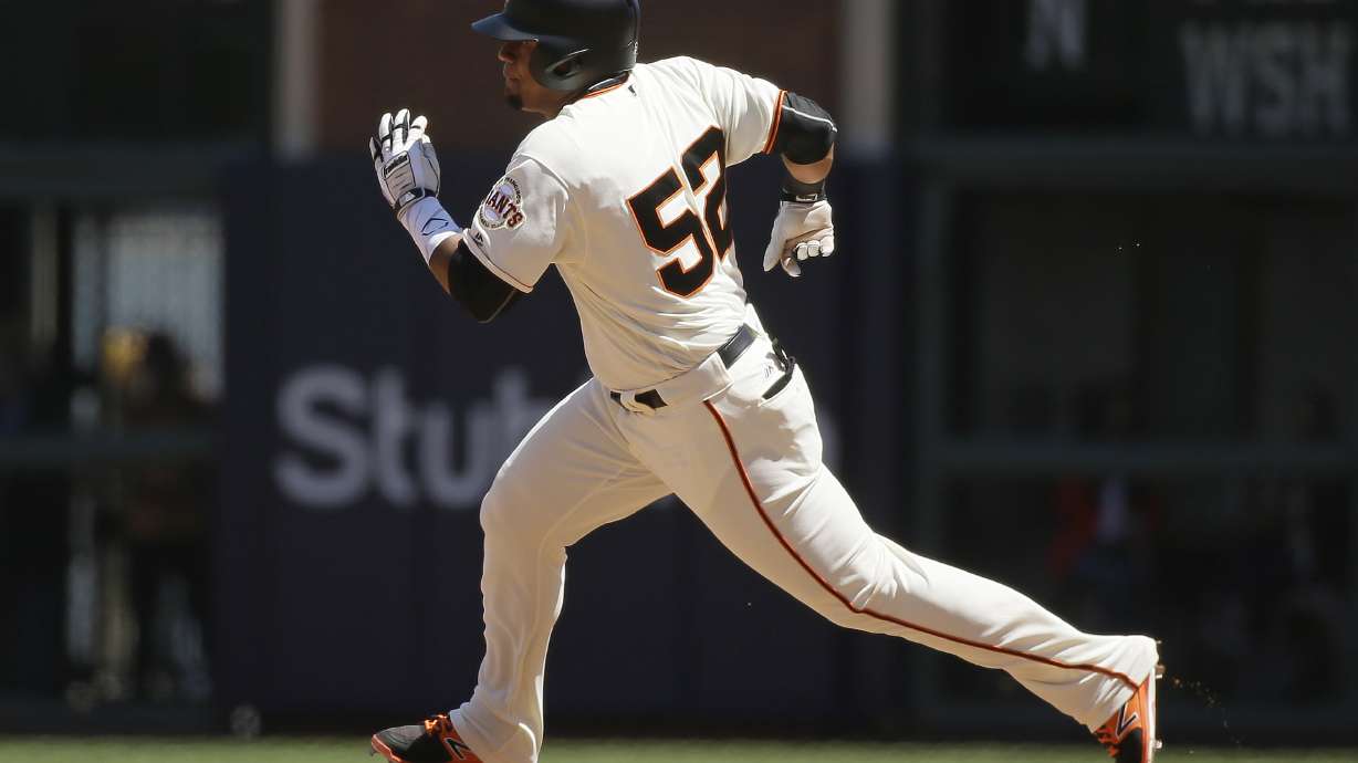 Belt drives in go-ahead run in Giants' 2-1 win over Pirates