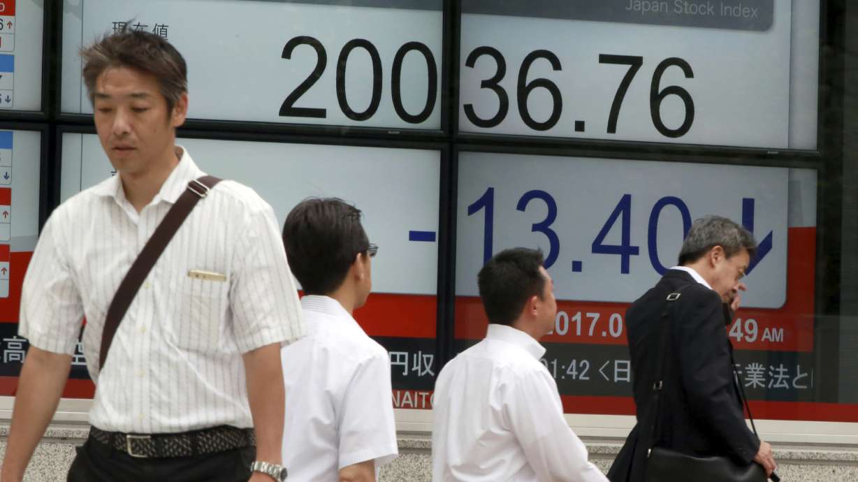 World stocks mixed amid raft of corporate earnings