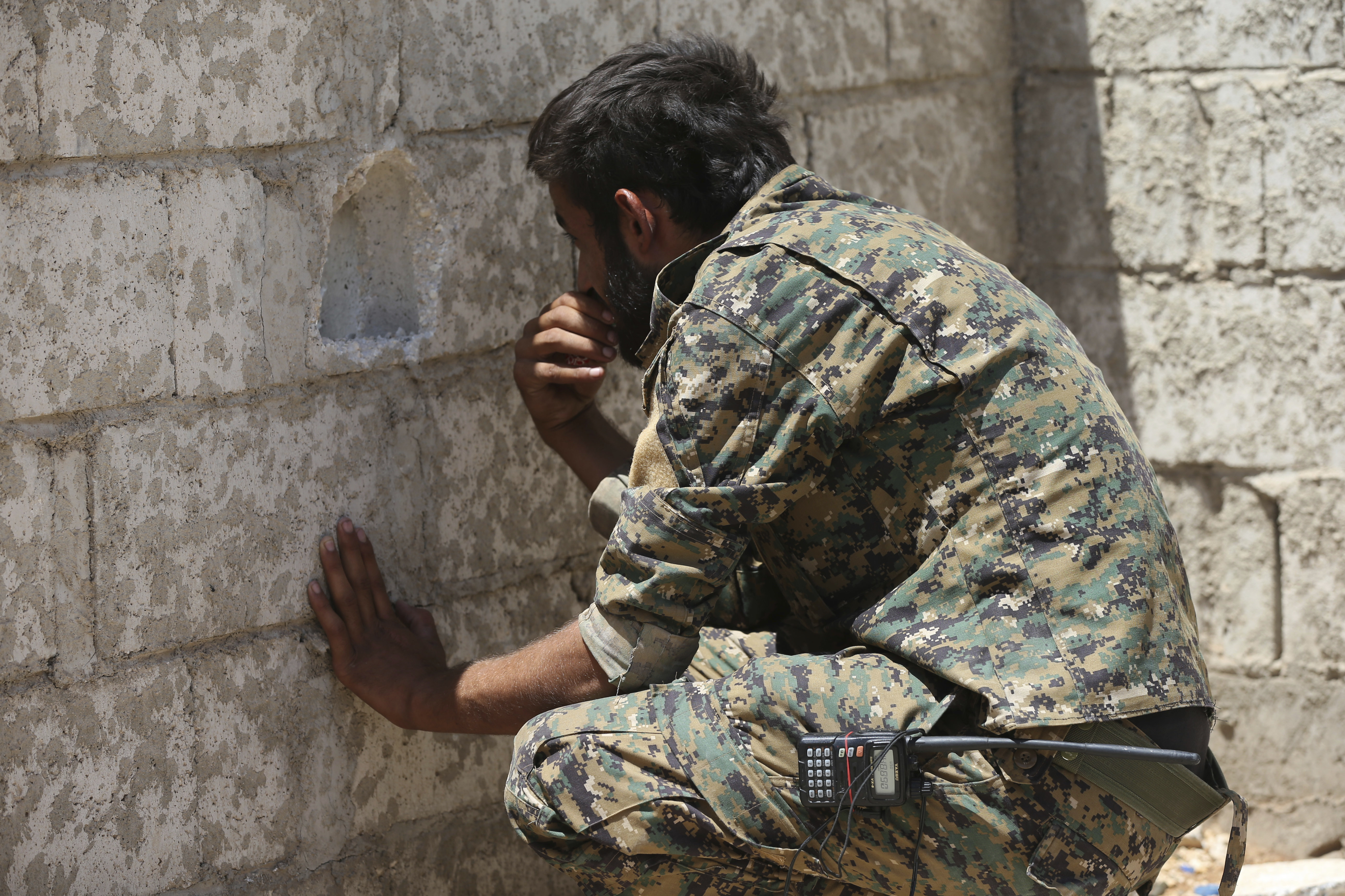 US-backed Syrian fighters now control almost half of IS city