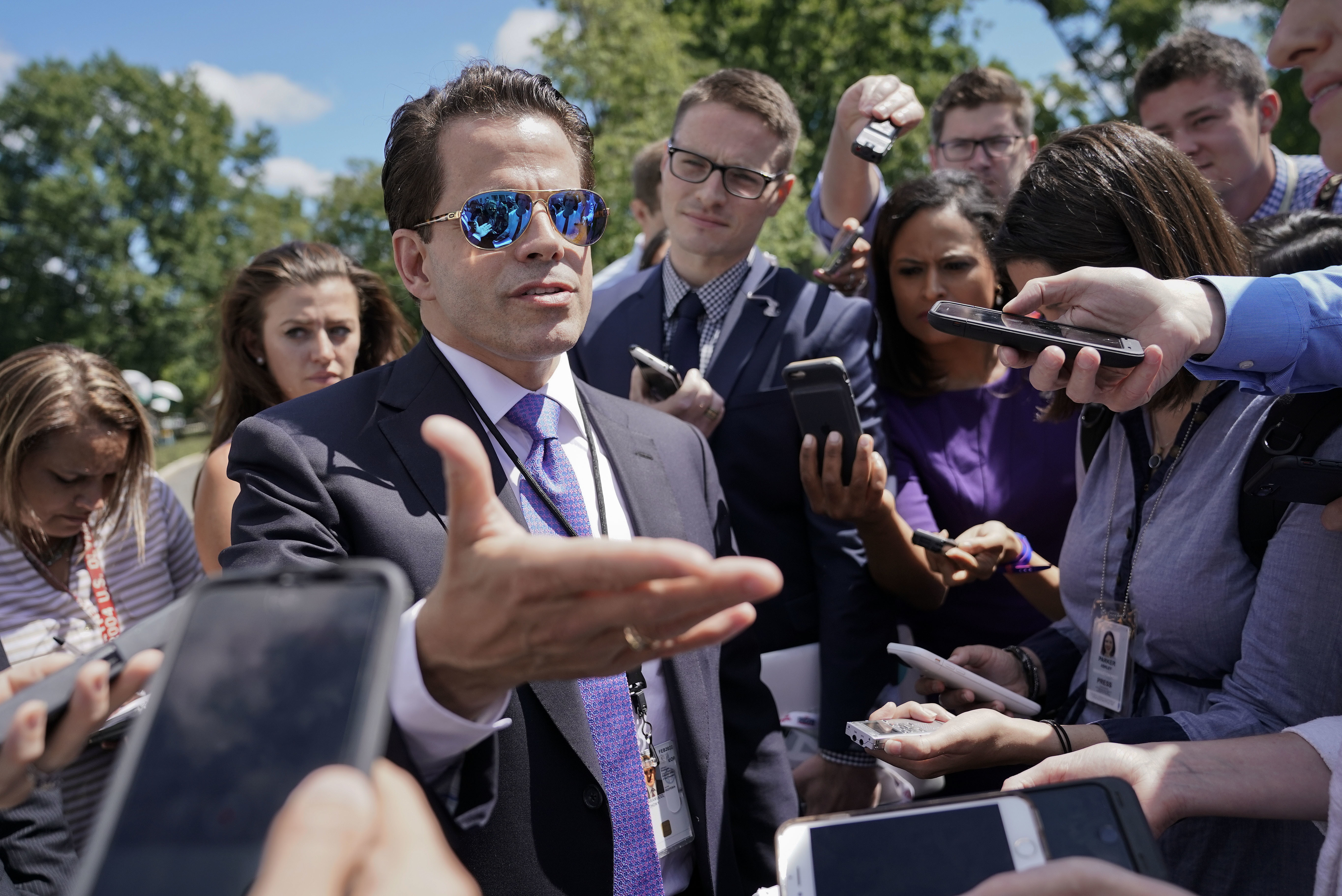 The Latest: Scaramucci steps back from 'colorful language'