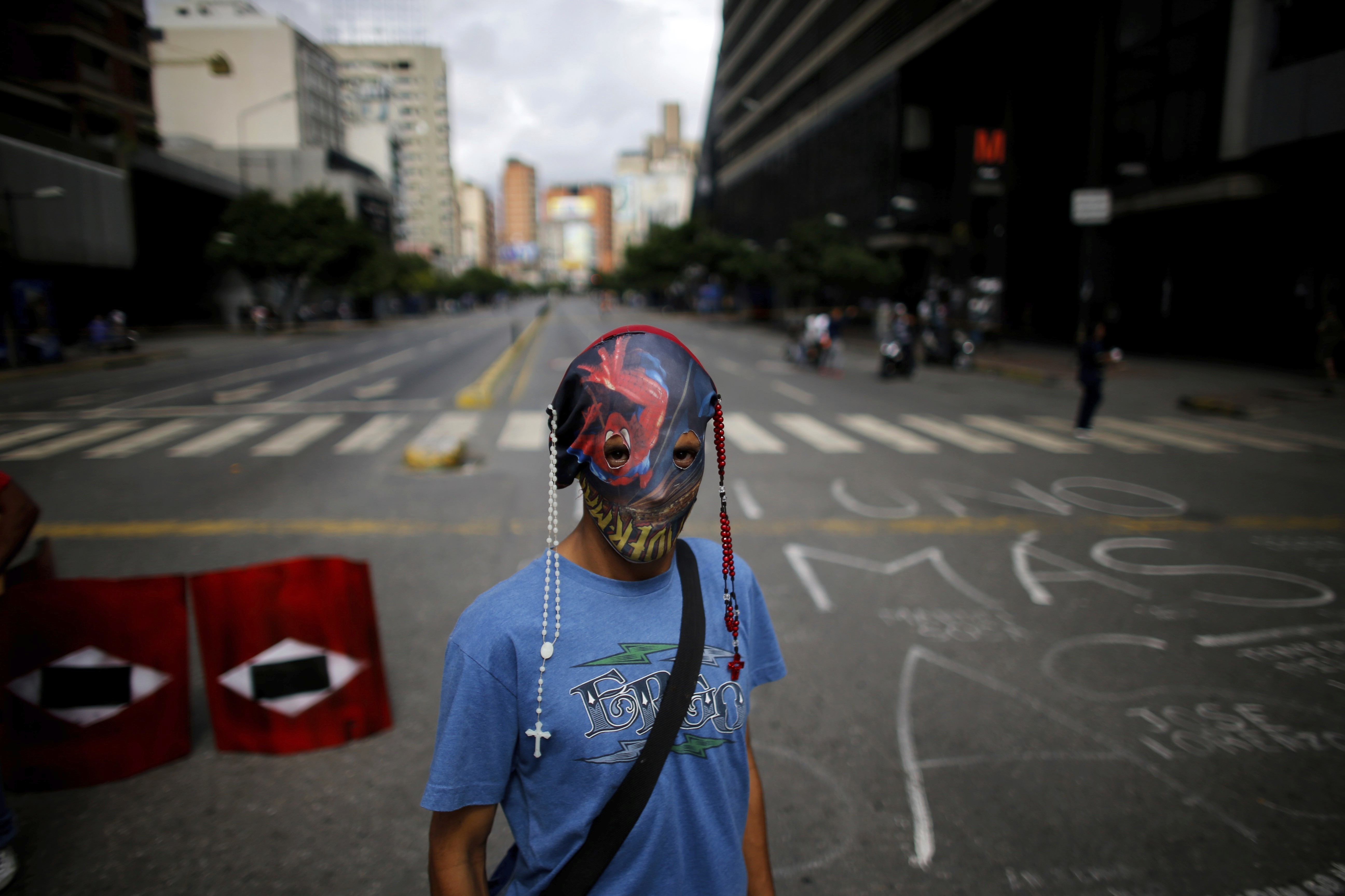 Deaths in Venezuela unrest hit 103 as polarizing vote nears