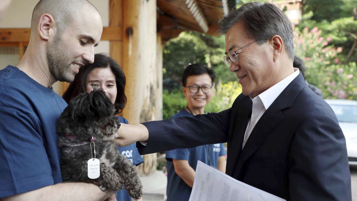 South Korean leader adopts dog saved from possible slaughter
