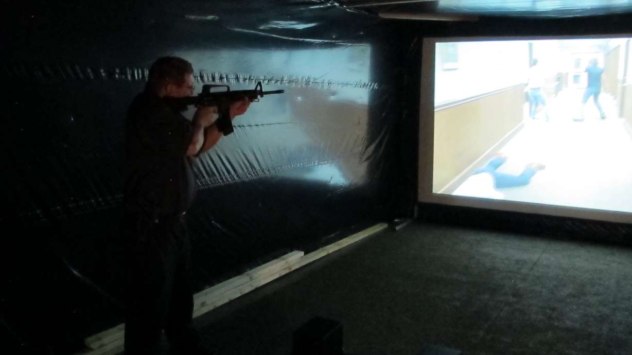 In shooting simulator, fairgoers aim from police perspective