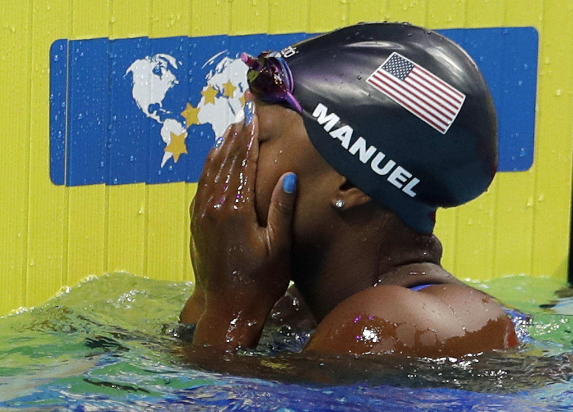 Manuel backs up historic Olympic win with world championship