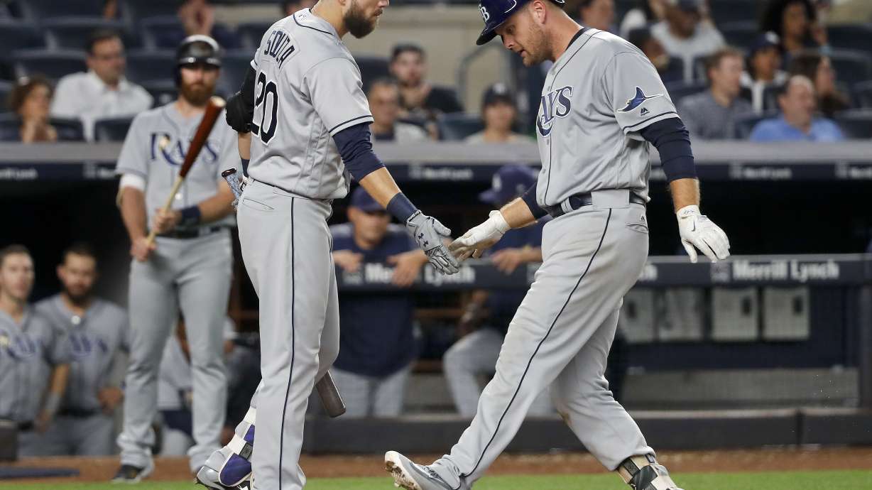 Tanaka perfect into 6th, Yanks top Rays 6-1 to regain lead