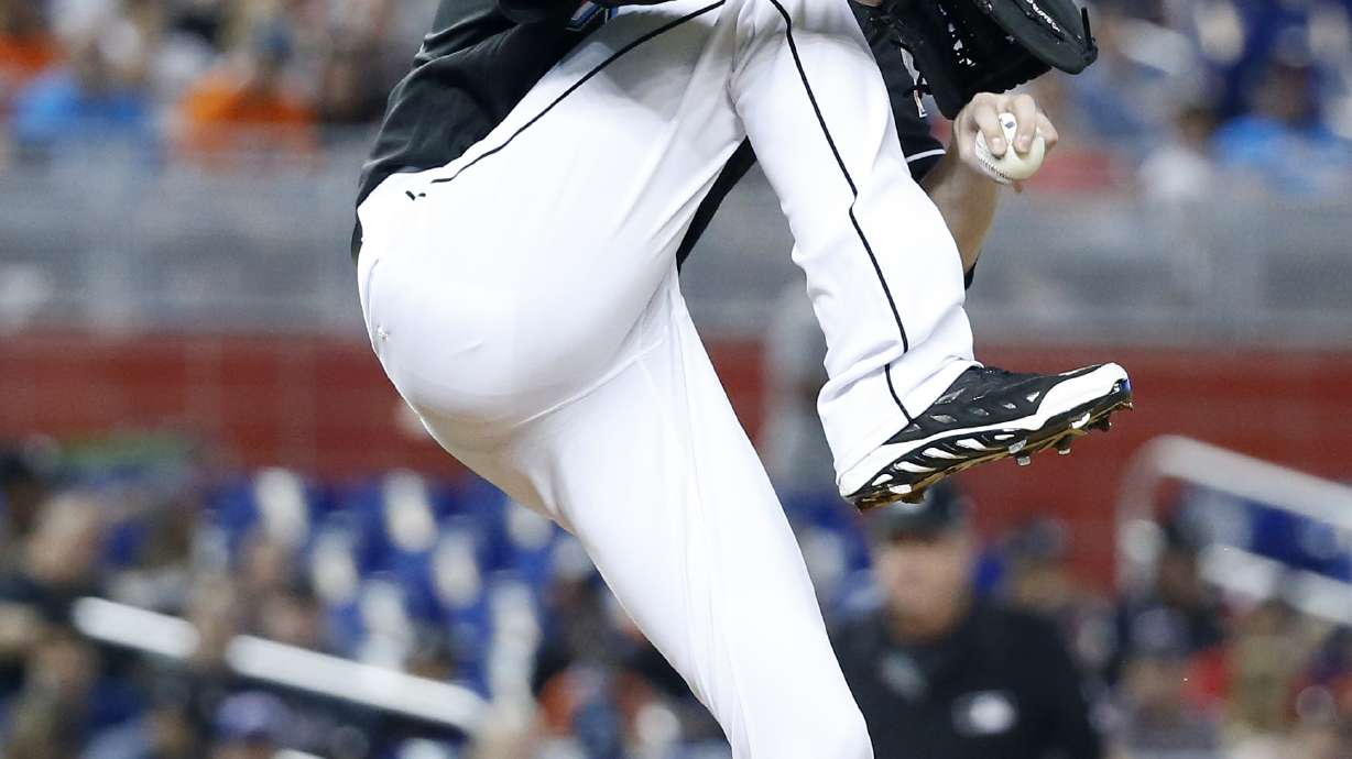 Conley strikes out seven, lifts Marlins past Reds, 7-3