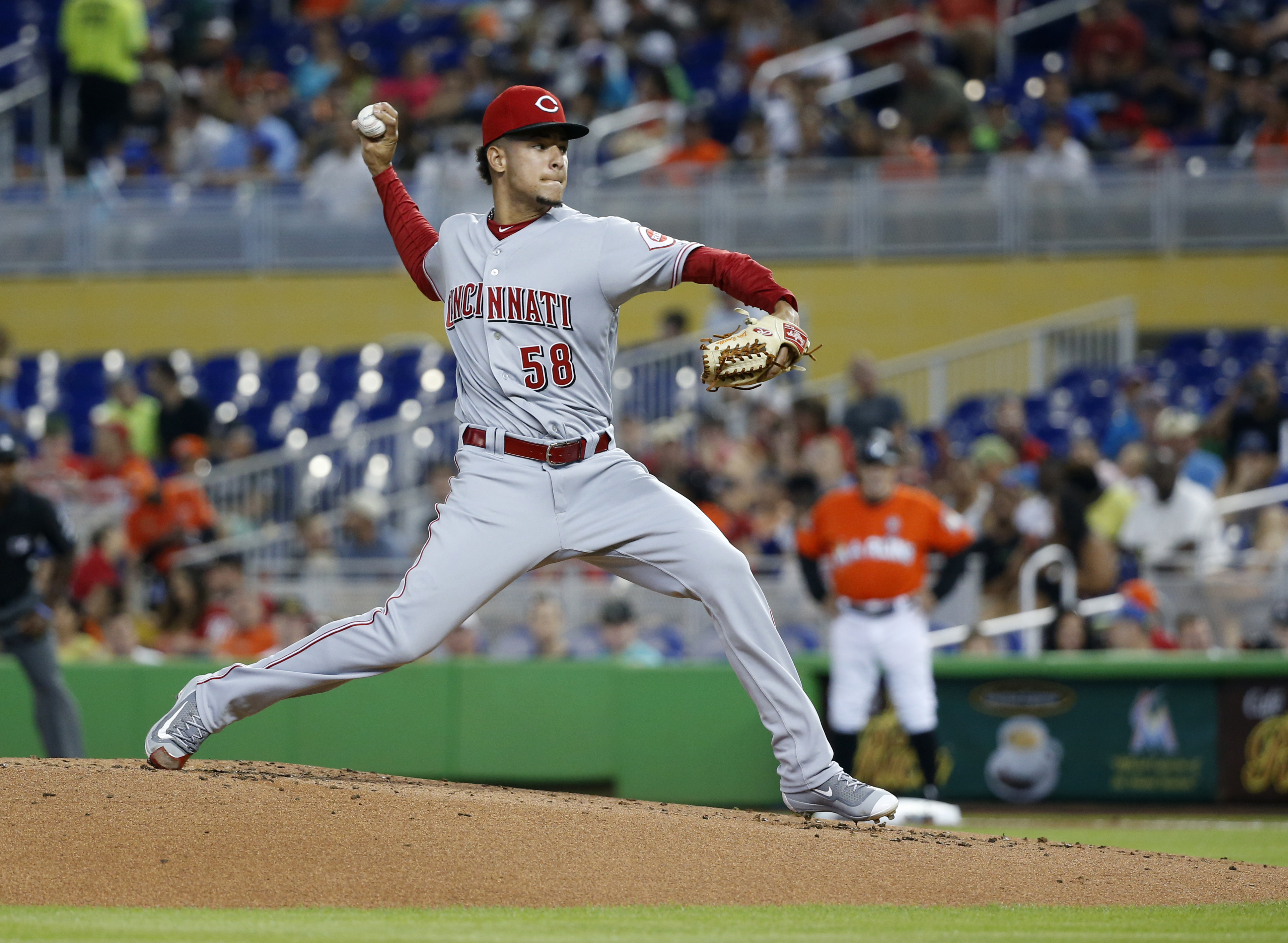Castillo goes 8 innings, Reds top Miami 6-4, end 6-game skid