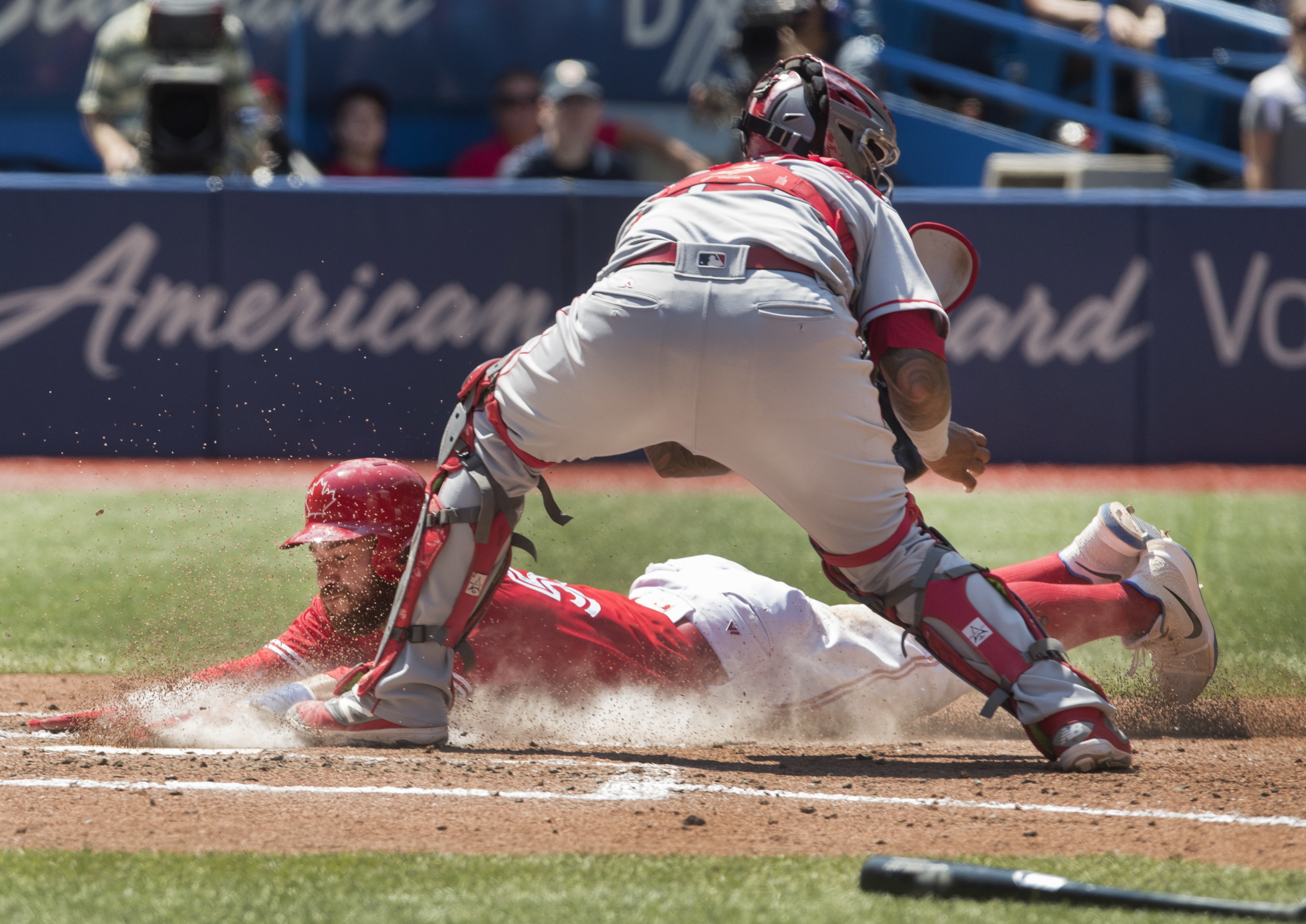 Pearce slams again, Jays score 7 in 9th, beat Angels 11-10