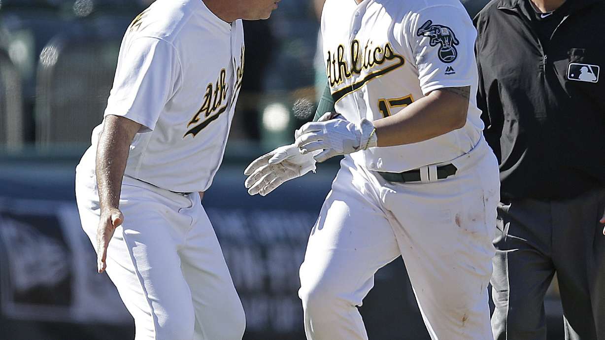 Alonso's HR in 12th powers A's past Twins, 6-5