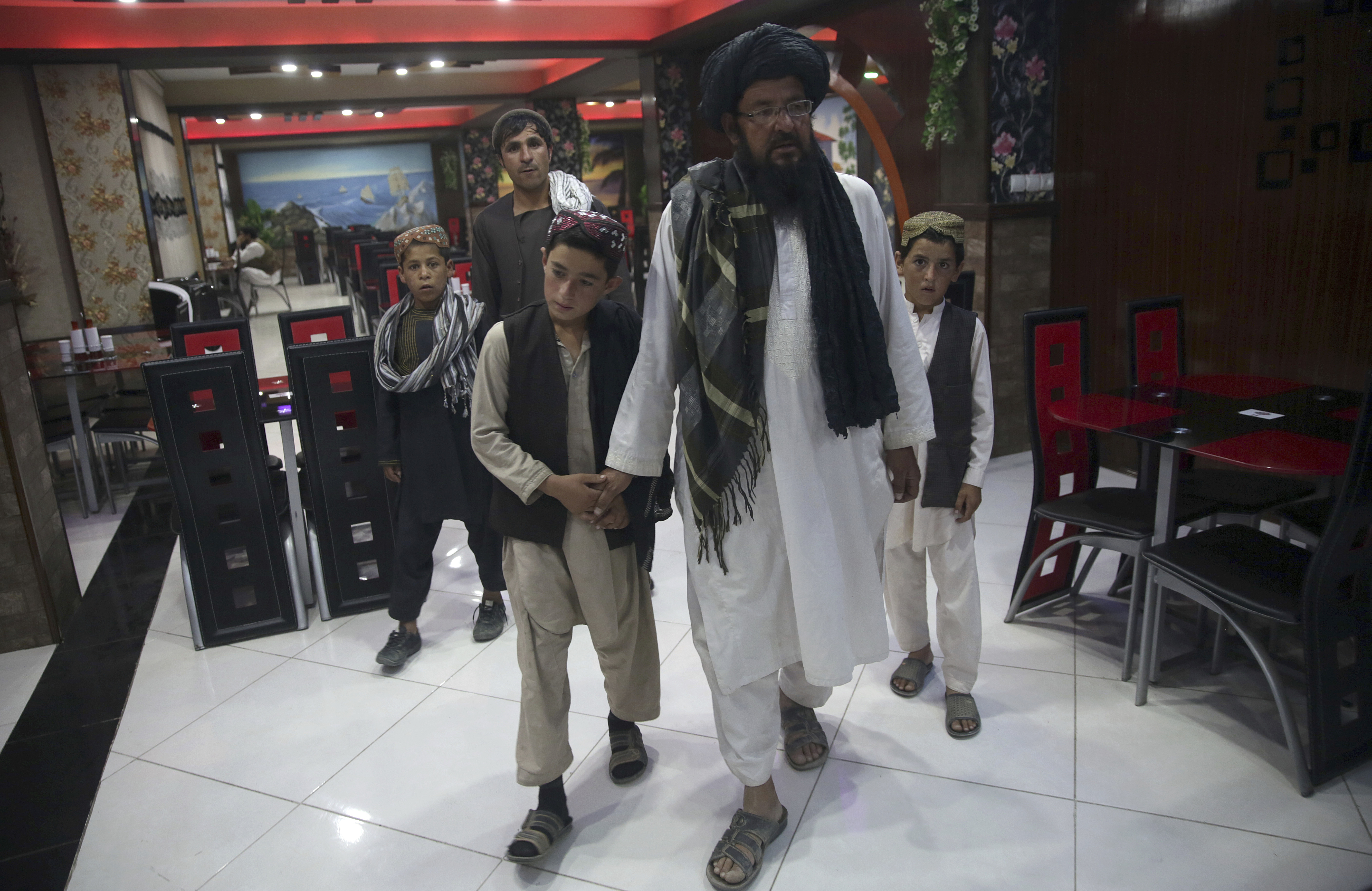 Officials: Young Afghans trafficked to study under Taliban