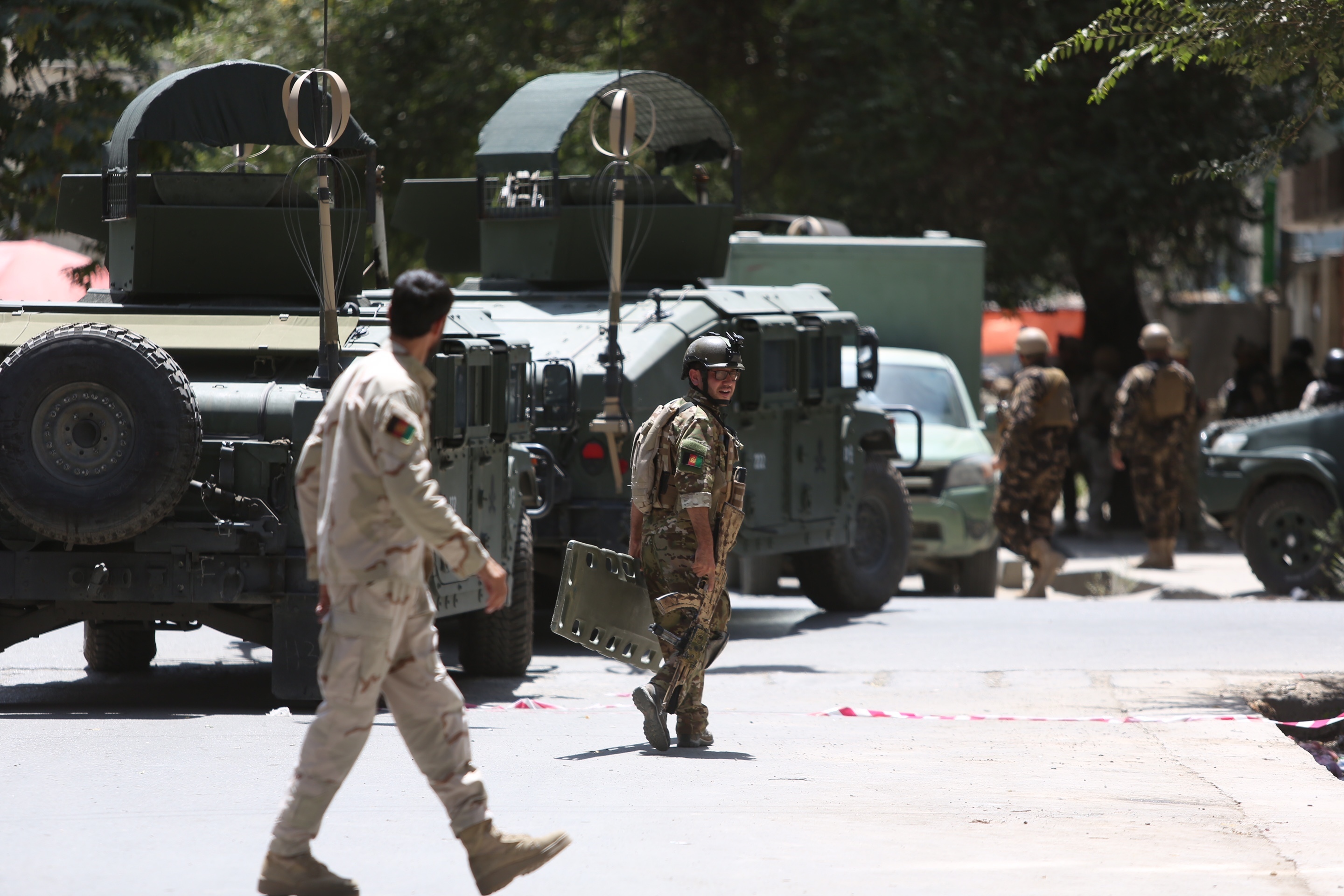 The Latest: Afghanistan says 2 Iraq embassy staff killed