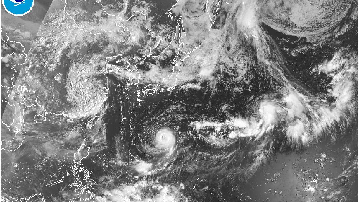 Typhoon weakens but could still threaten Japan
