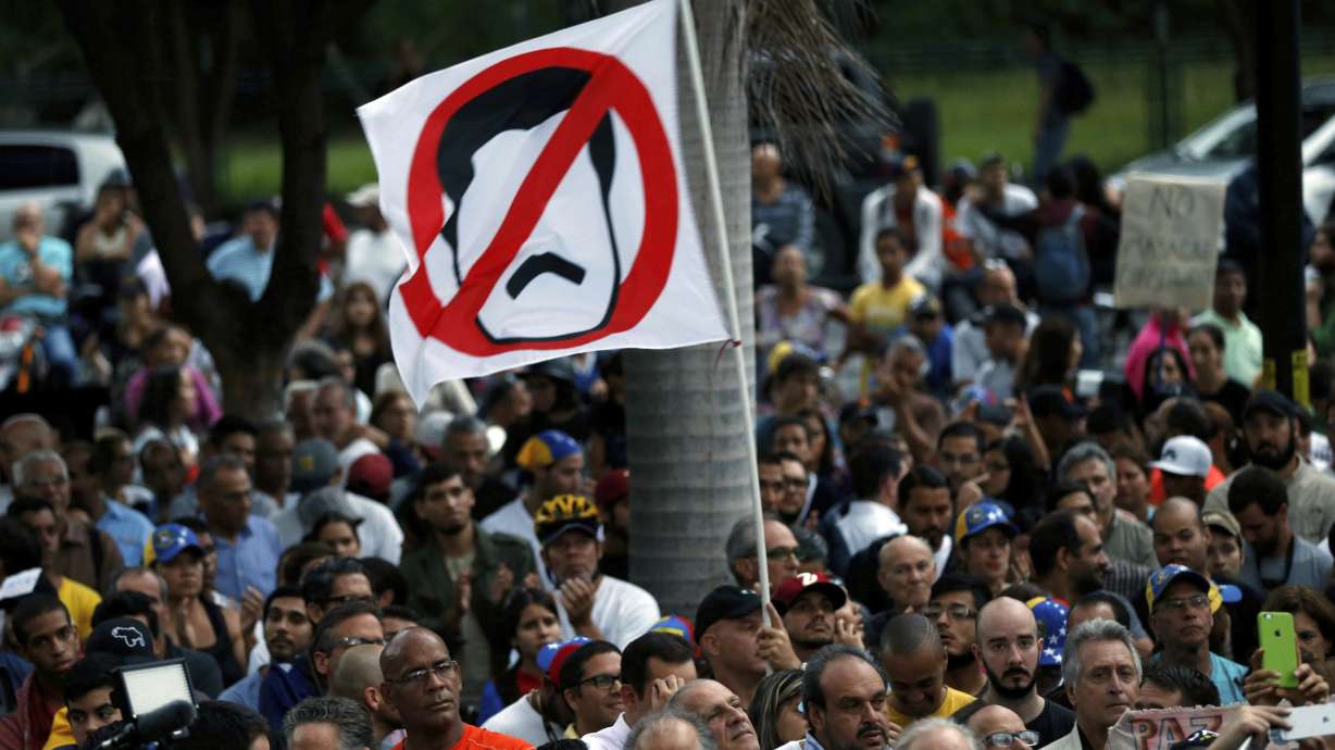 2 Venezuelan opposition leaders jailed as crisis escalates