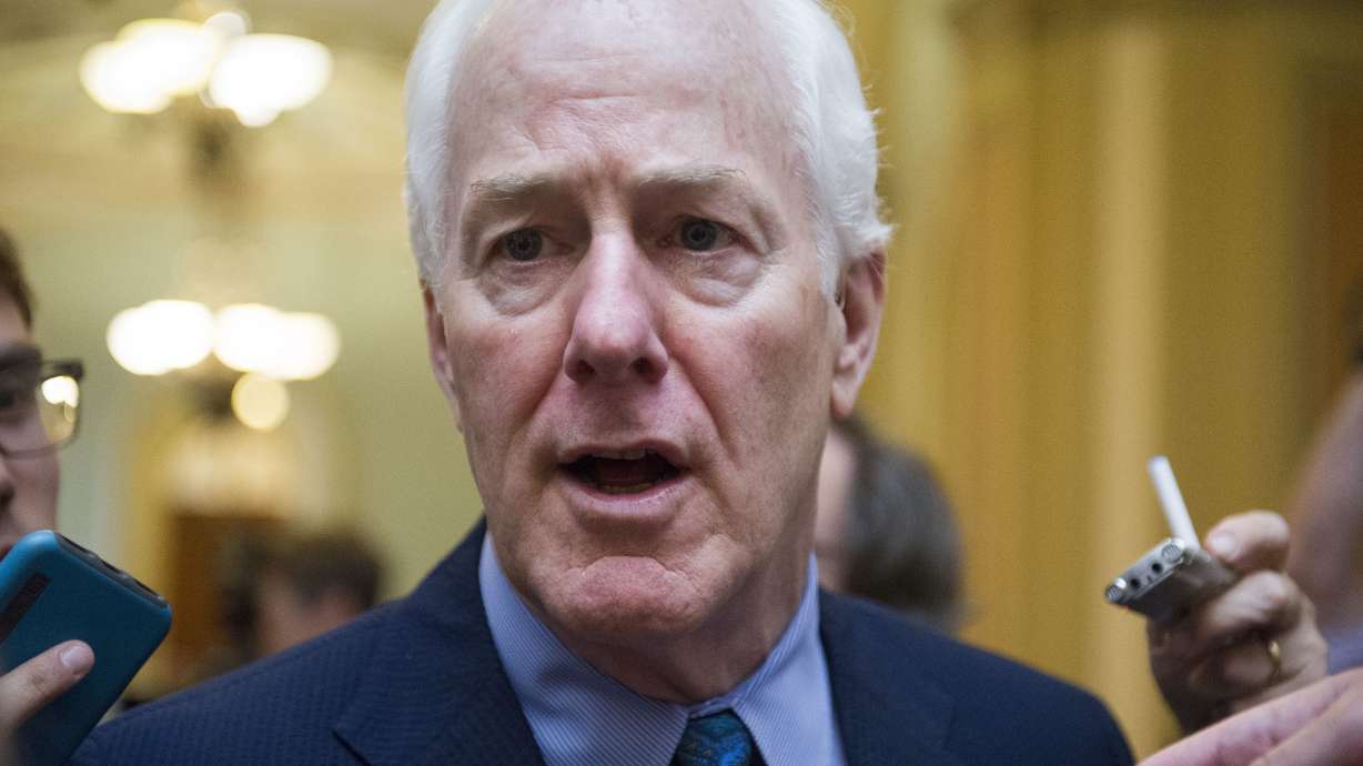 The Latest: States get involved in health care court case