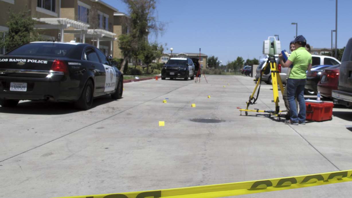 The Latest: Officer screams for help in California shooting