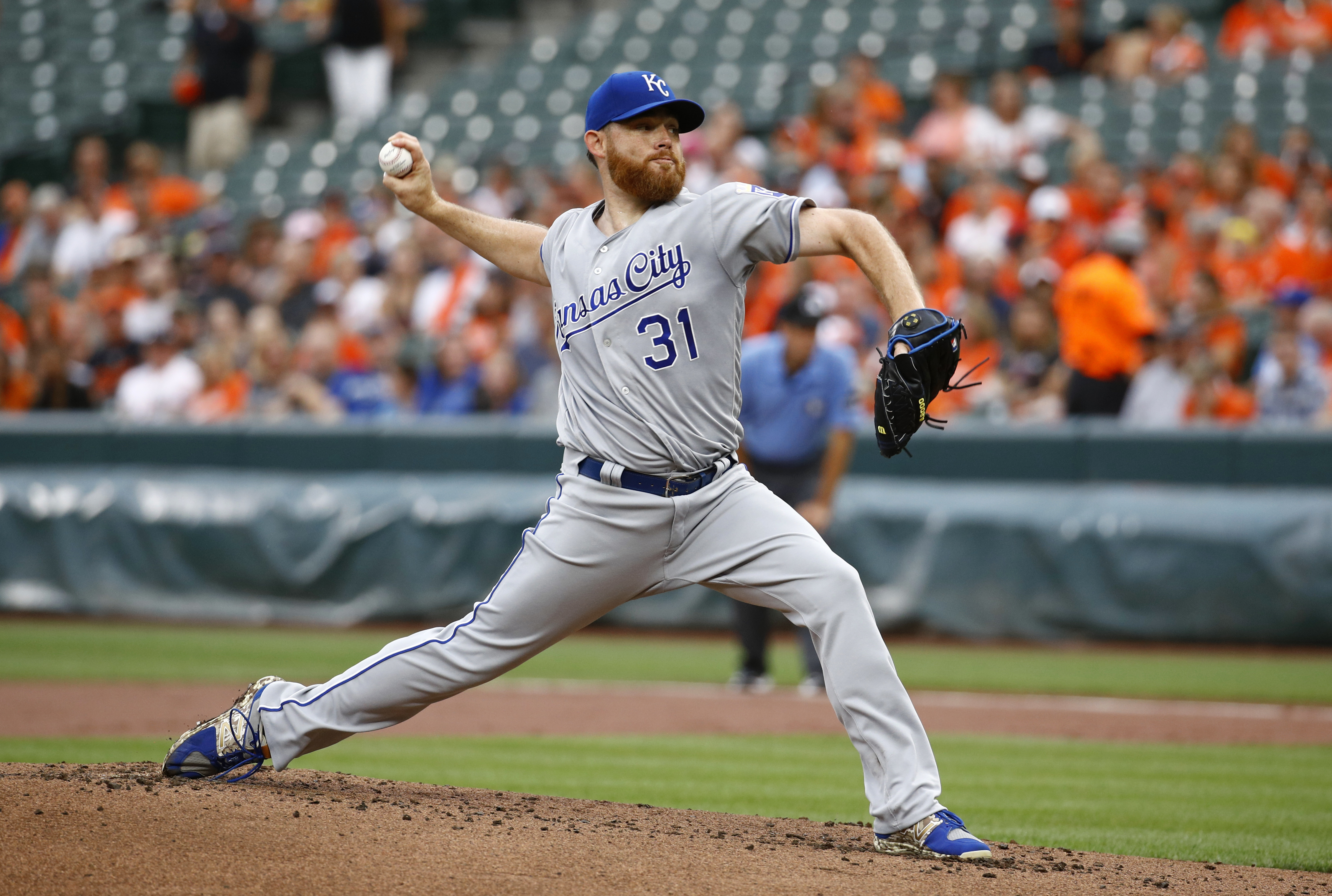 Bundy pitches 8 strong innings as Orioles beat Royals 7-2