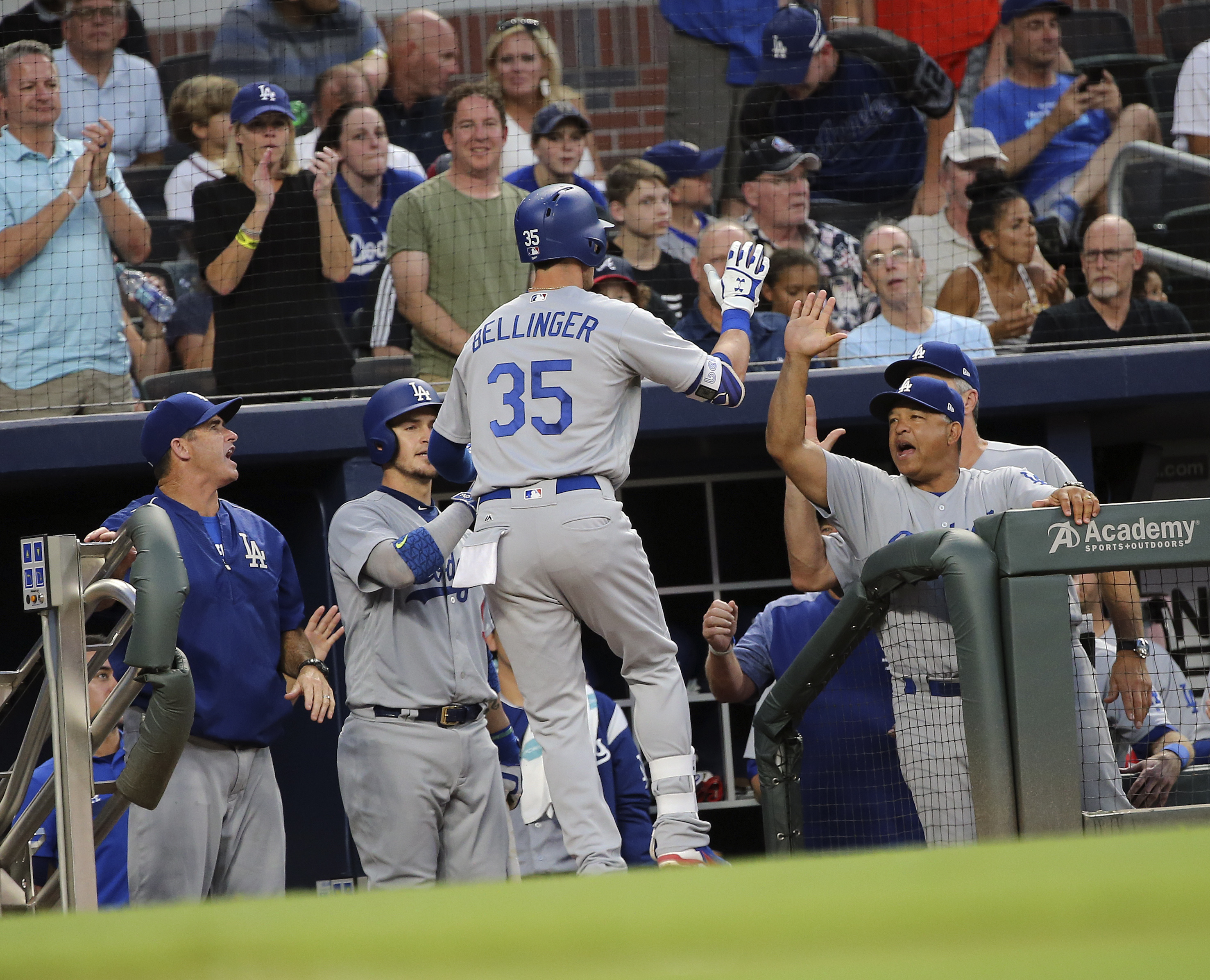 Maeda pitches Dodgers past Braves 3-2 for 9th straight