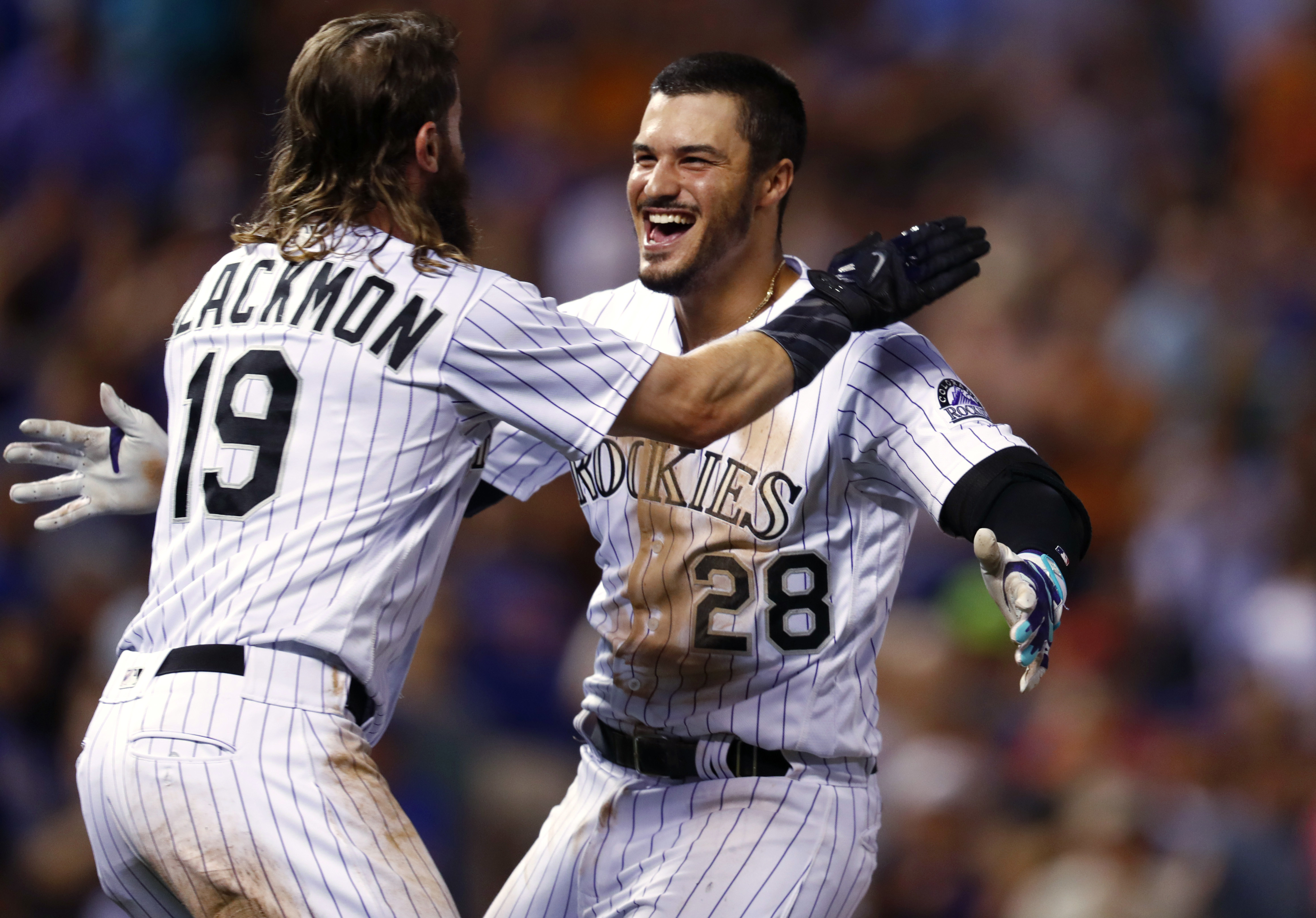 Arenado homers, then wins it in 9th as Rockies top Mets 5-4