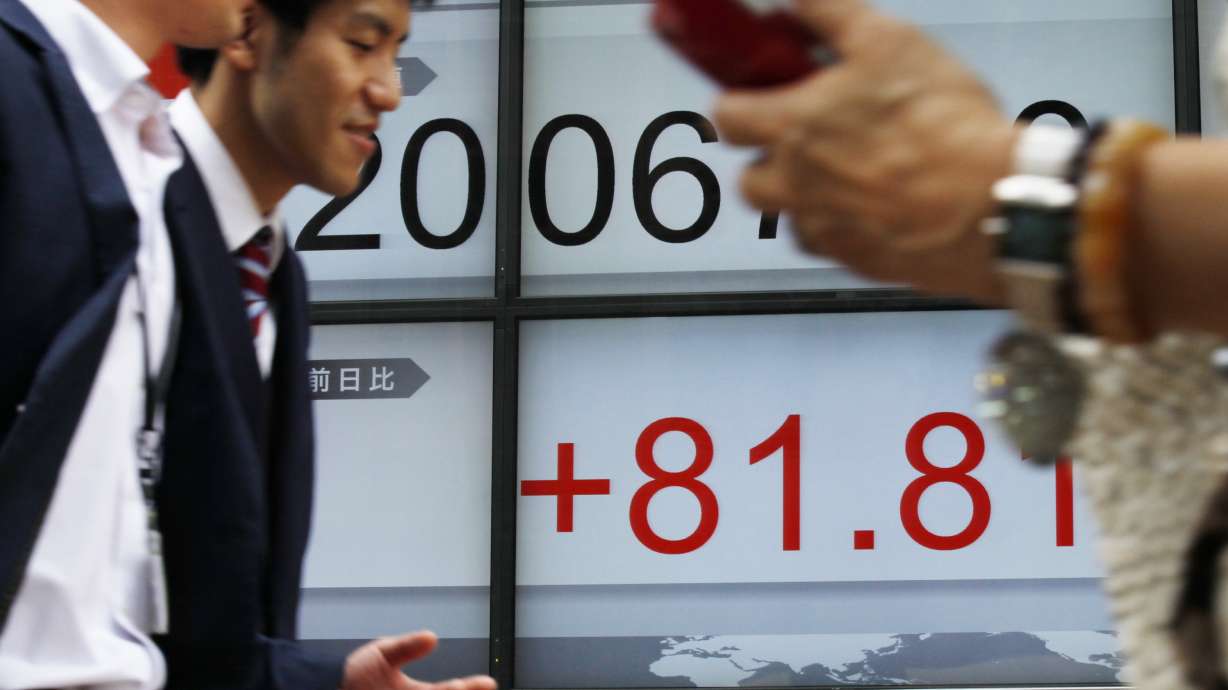 Asian stocks stronger on upbeat earnings, China factory data