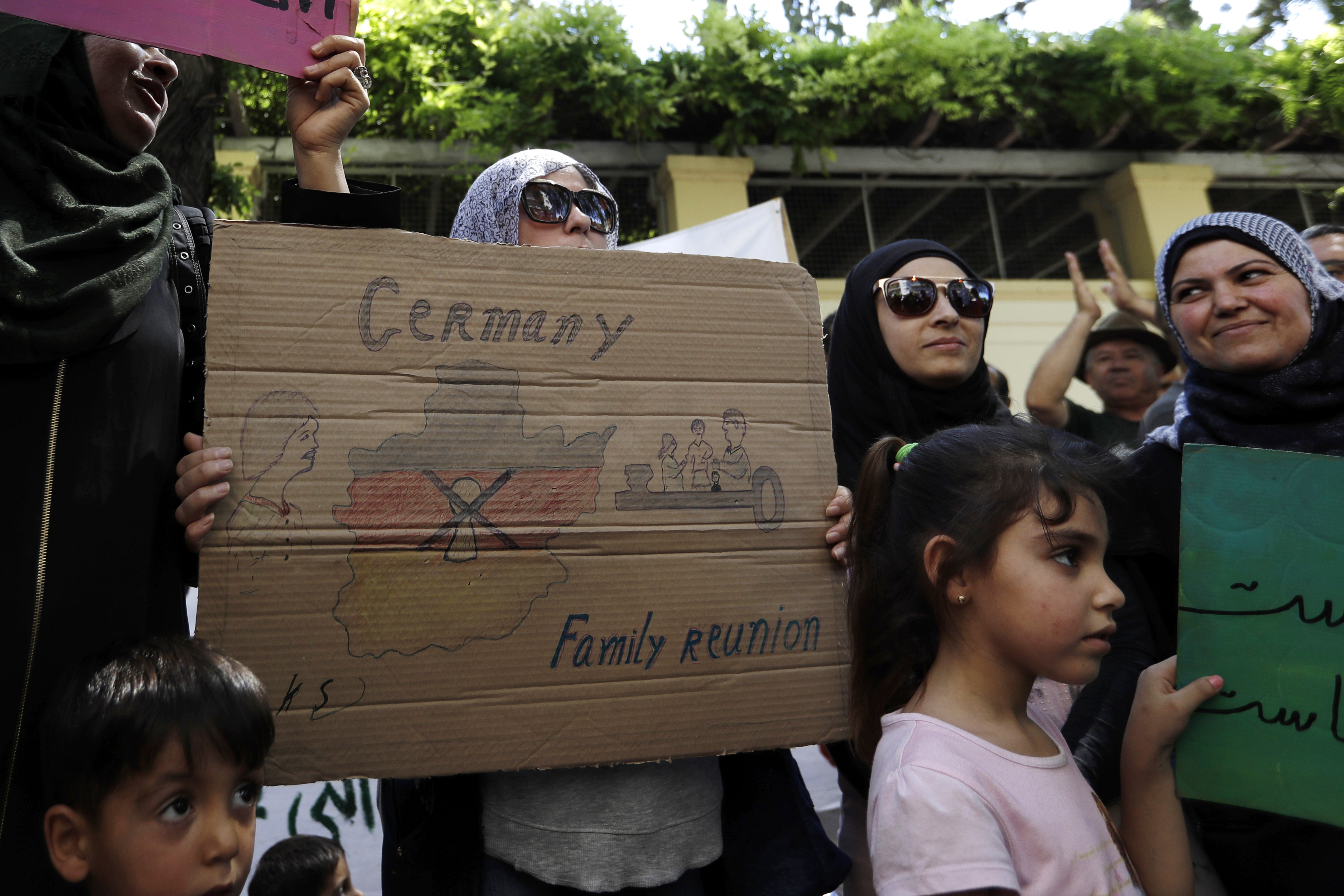 The Latest: Libya lawmakers cool on Italy's migrant mission