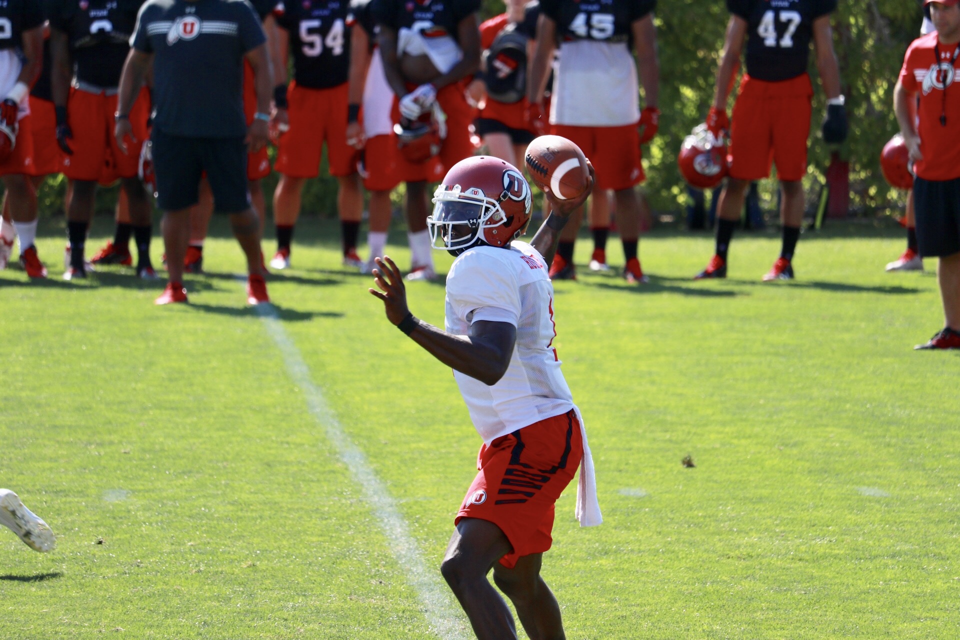 Sophomore quarterback Tyler Huntley throws a pass at Utah's practice on Aug. 1, 2017 (Photo: Josh Furlong, KSL.com).