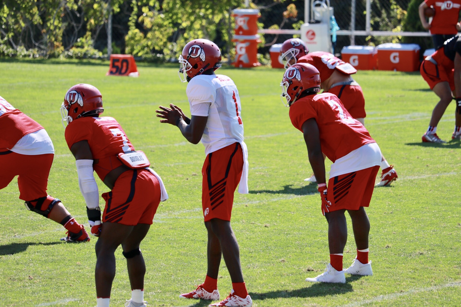 Quarterback Tyler Huntley with running backs Devonta'e Henry-Cole and Zack Moss at the University of Utah's practice Aug. 1, 2017 (Photo: Josh Furlong, KSL.com).