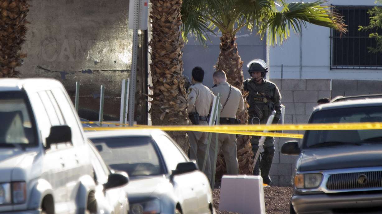 Vegas police shootout wounds officer, leaves suspect dead