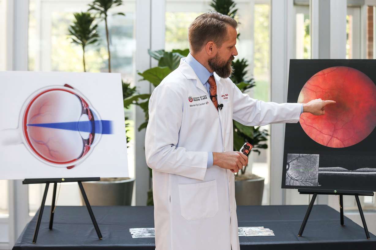 Dr. Jeff Pettey, associate professor of ophthalmology, speaks about the risks of viewing the upcoming solar eclipse without proper eye protection at the John A. Moran Eye Center in Salt Lake City on Wednesday, Aug. 2, 2017. (Photo: Spenser Heaps, Deseret News)