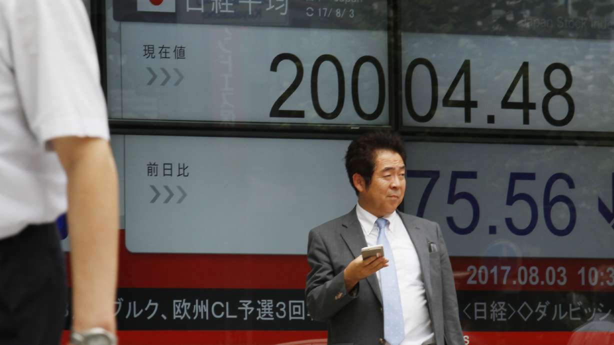 Global stocks mixed after Dow record, pound falls