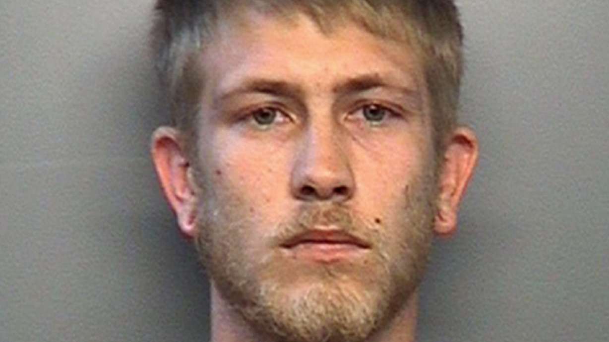 Hearing delayed for man charged in Indiana officer's slaying