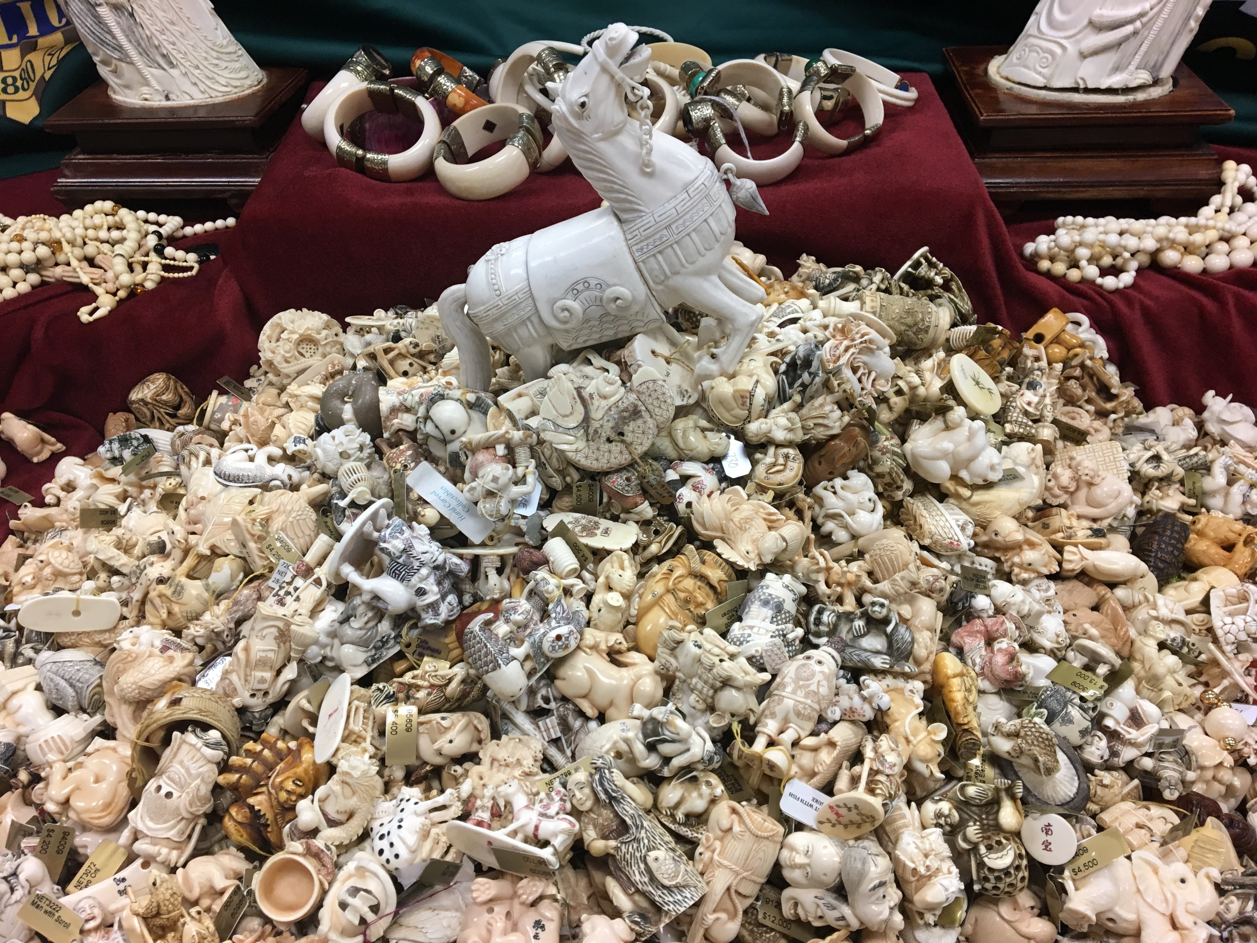 The Latest: 2 tons of seized ivory is being crushed in NYC