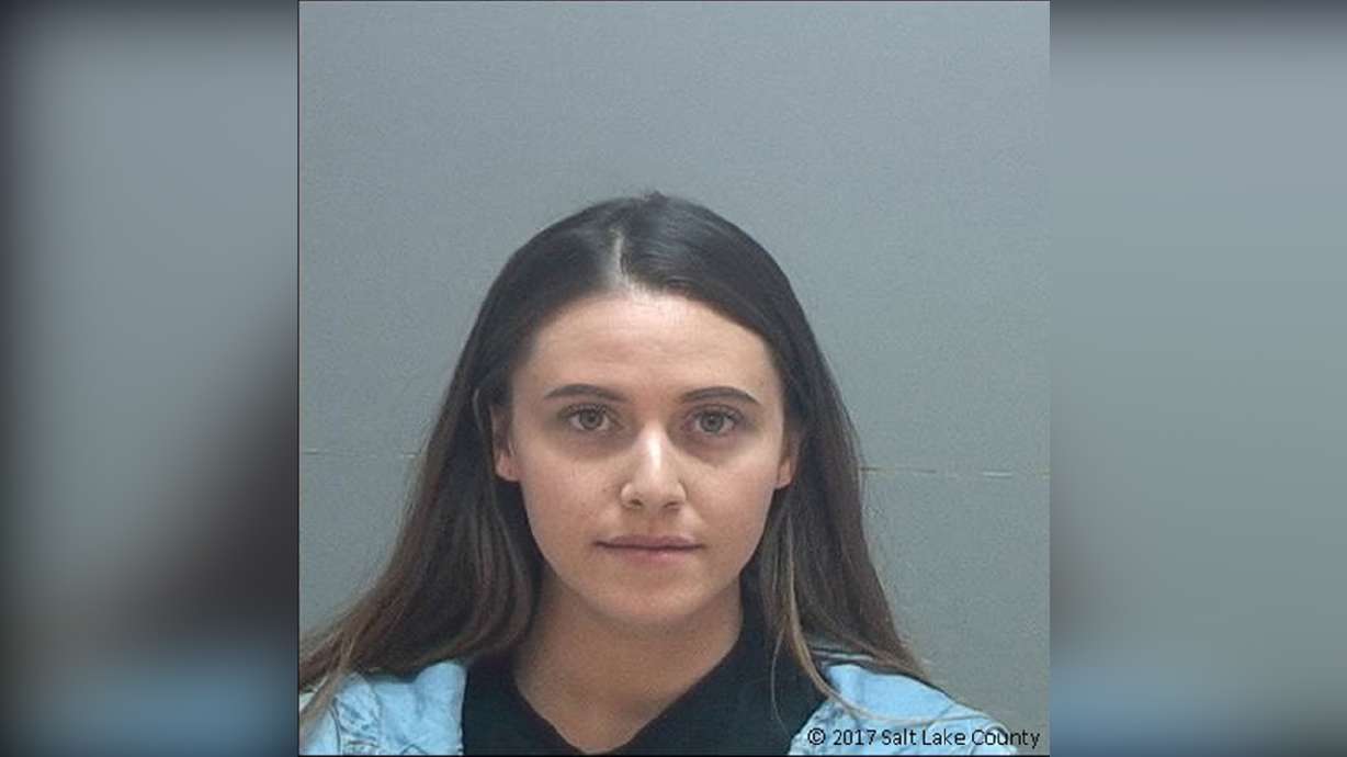 Woman kicked off flight arrested for vandalizing 6 patrol cars, police say