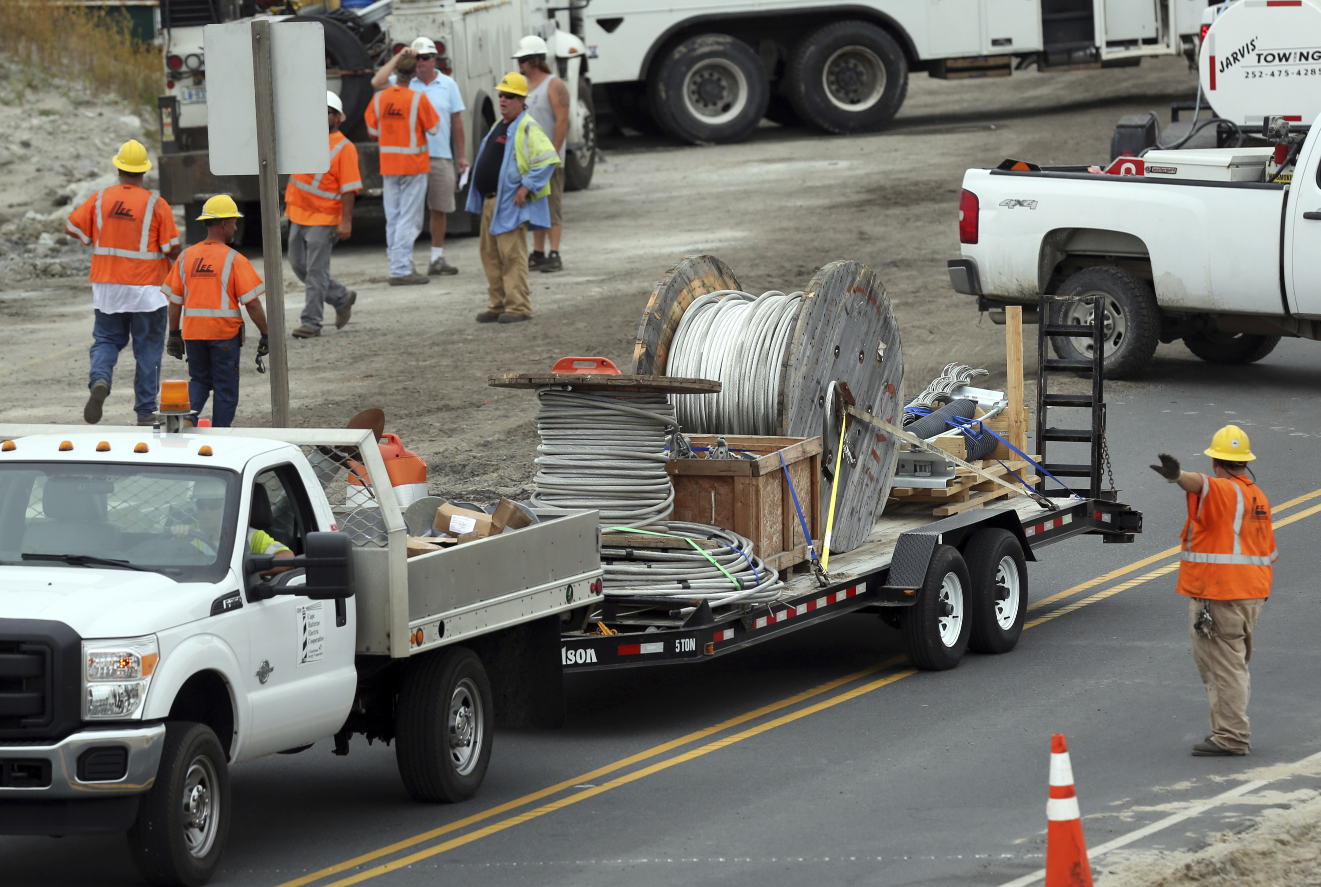 The Latest: North Carolina islands tally outage losses