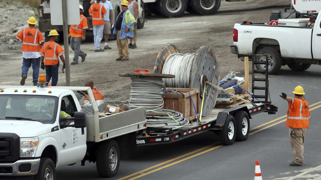 The Latest: North Carolina islands tally outage losses