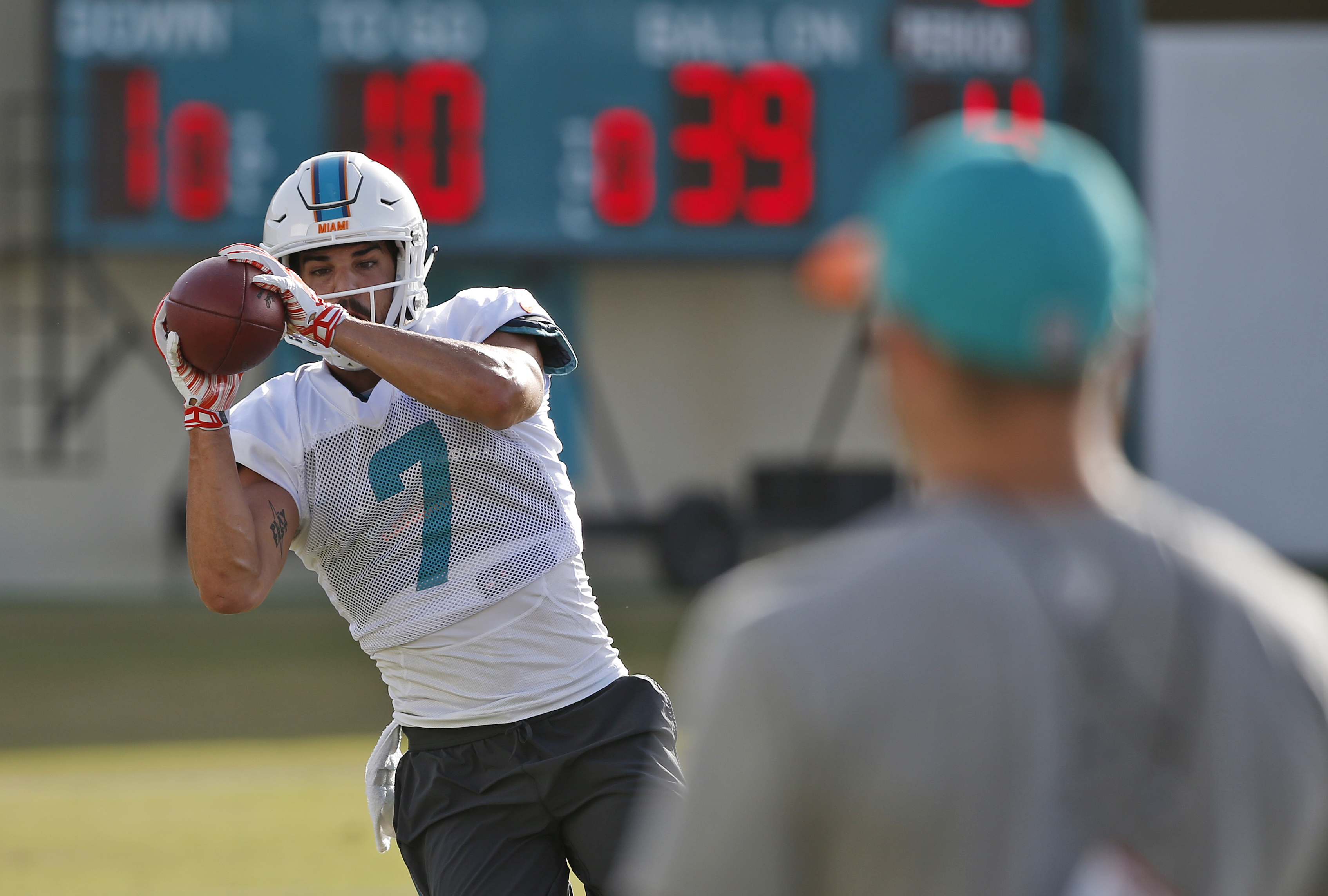 Column: Dark cloud lingers over football as season begins