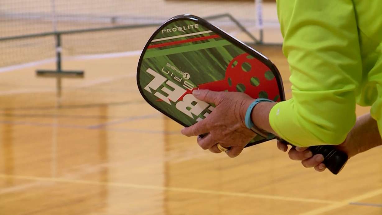 Pickleball playgrounds are popping up in church courts, parks and backyards. The sport is described as a mix of tennis, badminton, and pingpong. (KSL TV)