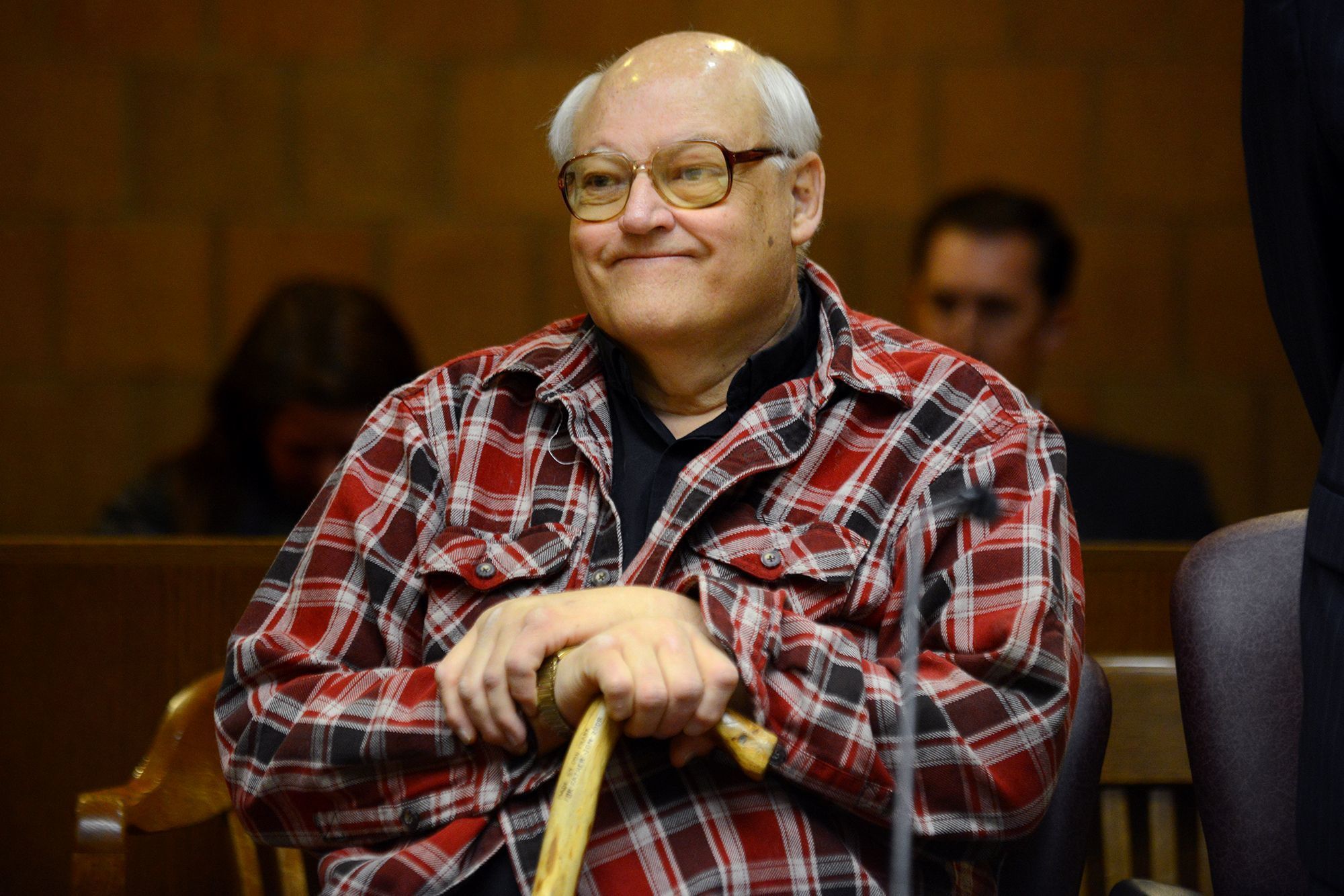 Priest accused of embezzlement seeks $800K seized by police