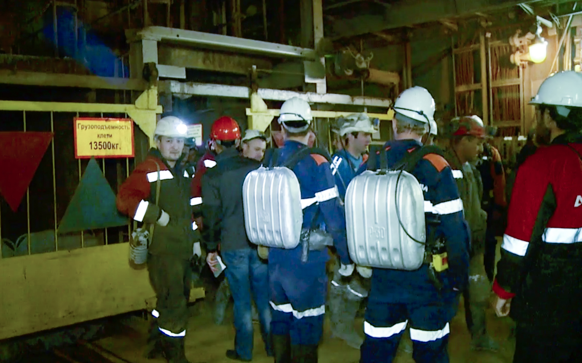 Russian miner rescued from flooded mine, 8 still missing