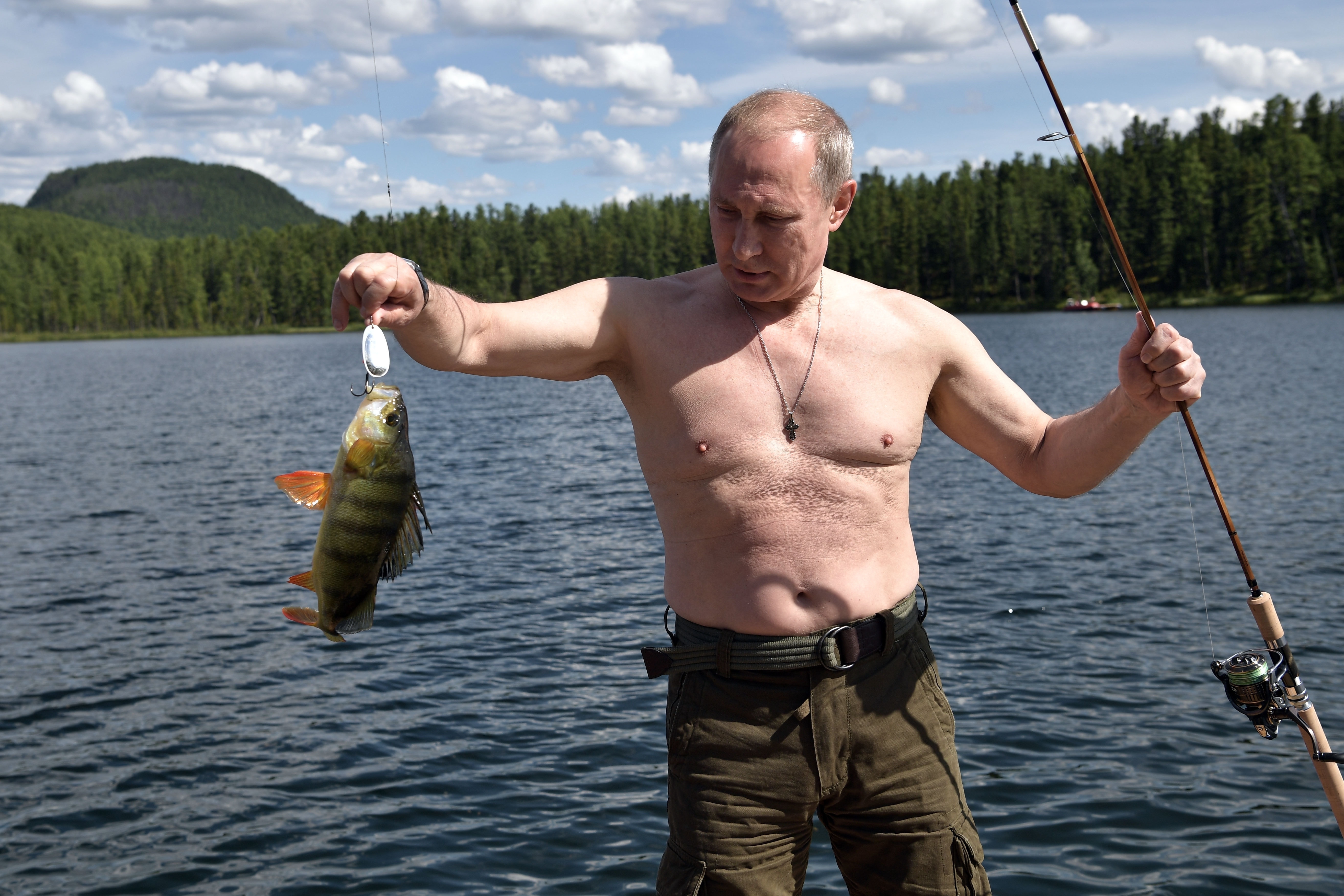 Russia's Putin shows off spoils from Siberia fishing trip