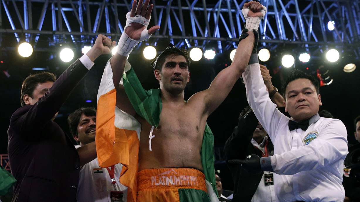 Indian boxer beats Chinese rival but doesn't want his belt