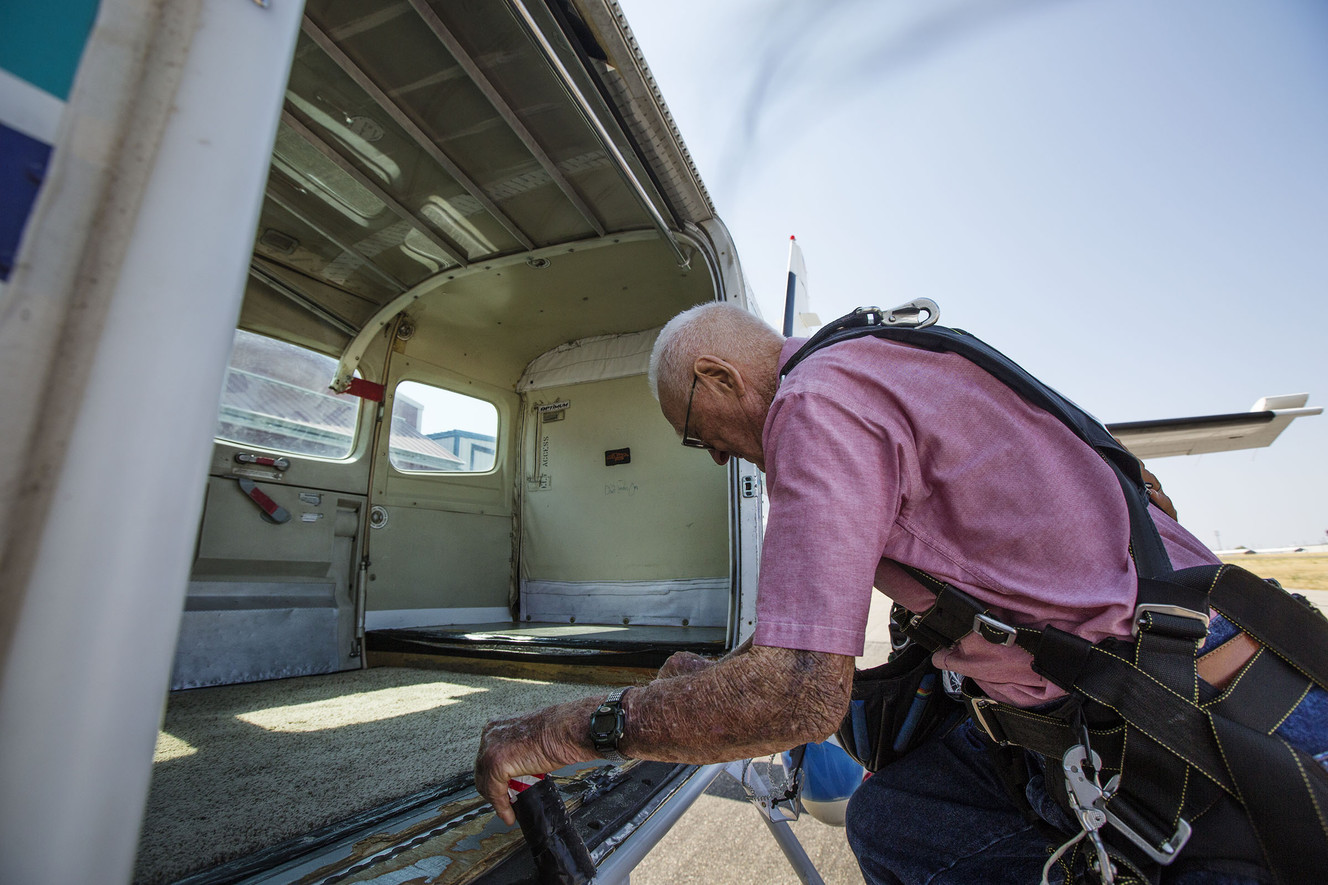 Wendell Ashcroft climbs into the plane at Skydive Ogden in Ogden on Saturday, Aug. 5, 2017. (Photo: Kelsey Brunner, Deseret News)