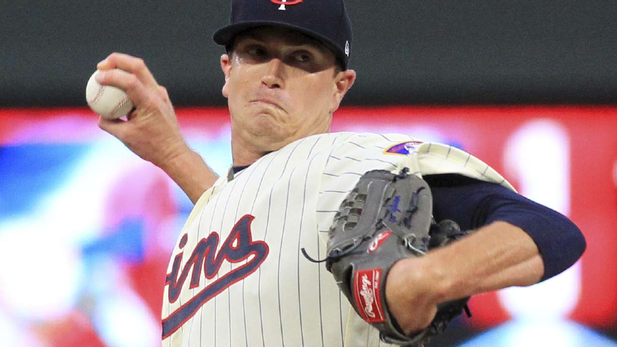 Hamels throws complete game No. 16 as Rangers beat Twins 4-1