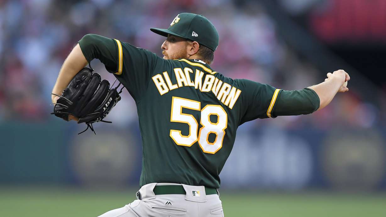 Rookie Blackburn cools off Angels in A's 5-0 win